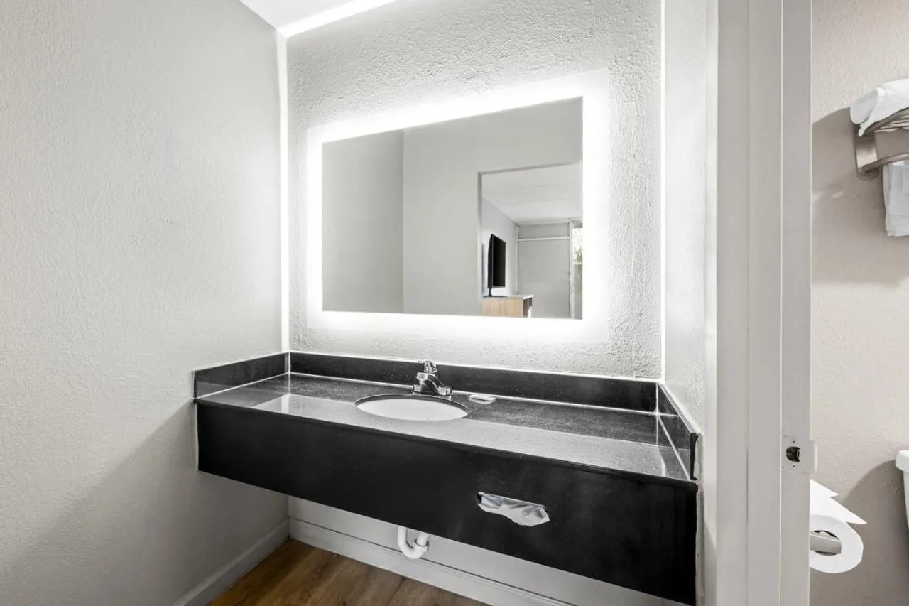 Bathroom in Super 8 by Wyndham Kingsport /I-81