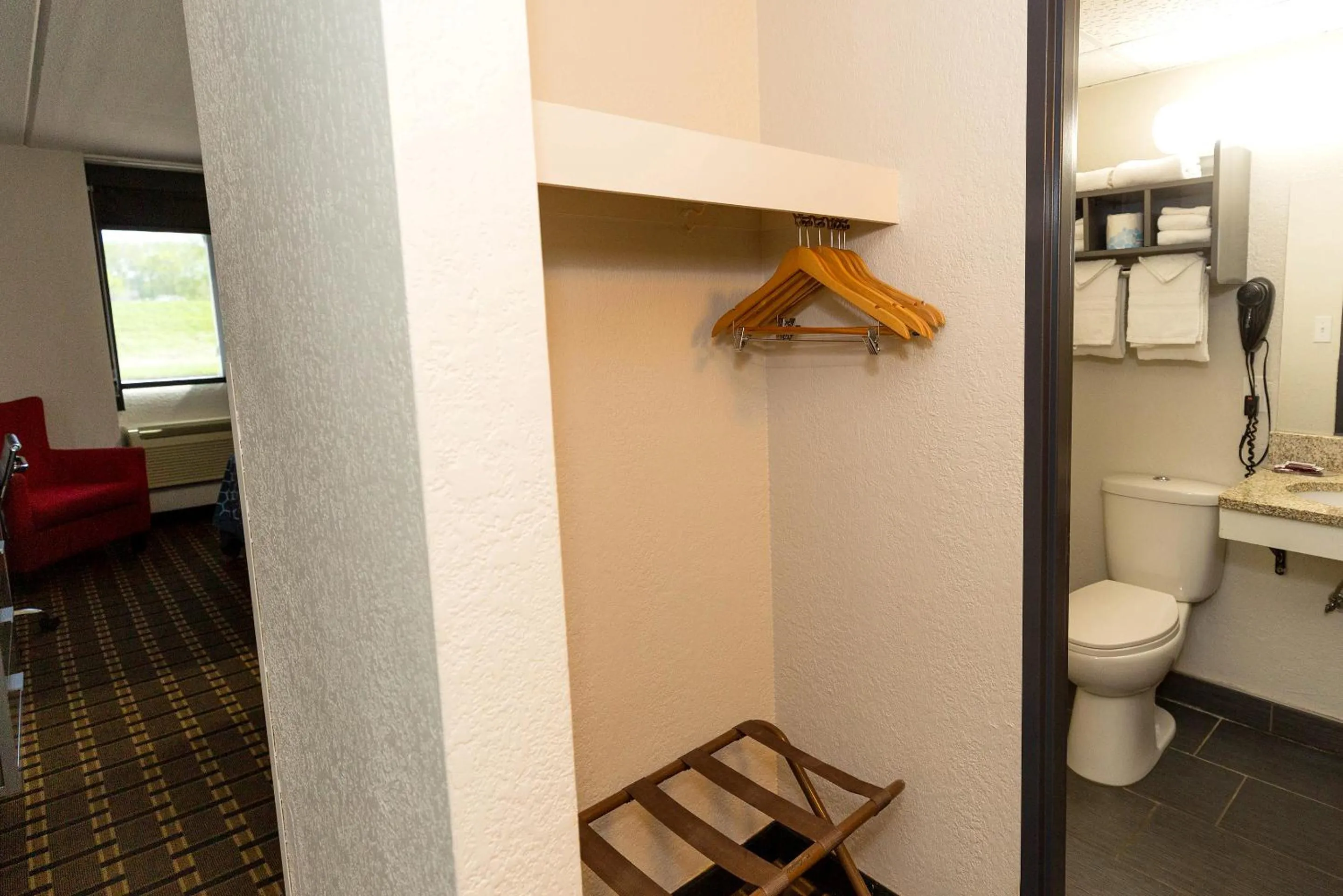 Toilet in Coratel Inn & Suites by Jasper Mankato