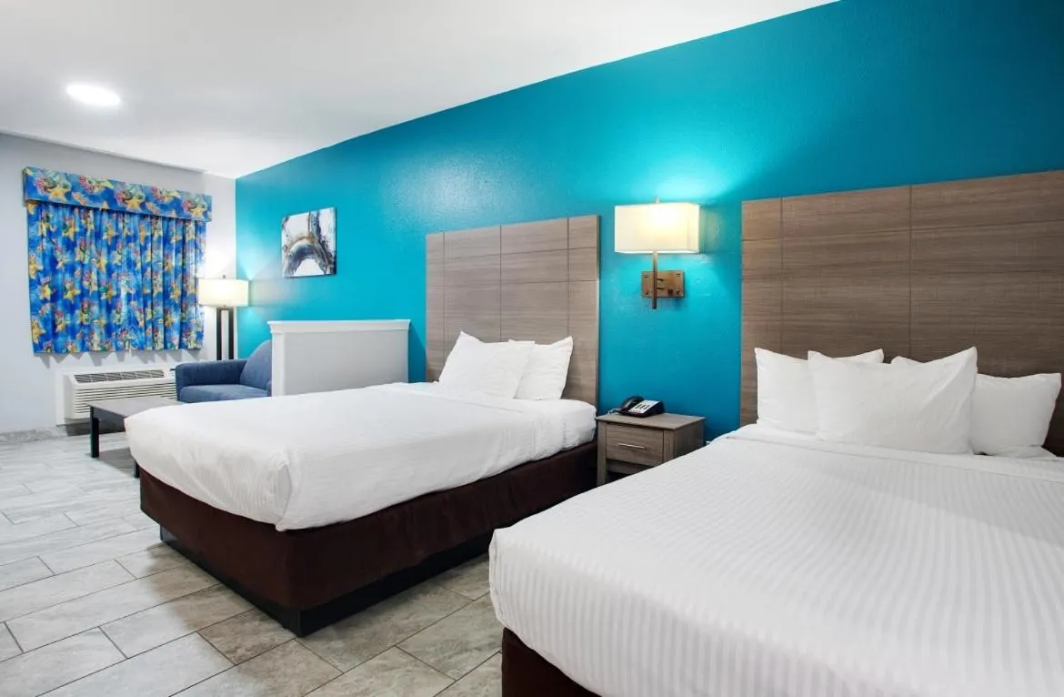 Photo of the whole room, Bed in Plantation Suites and Conference Center