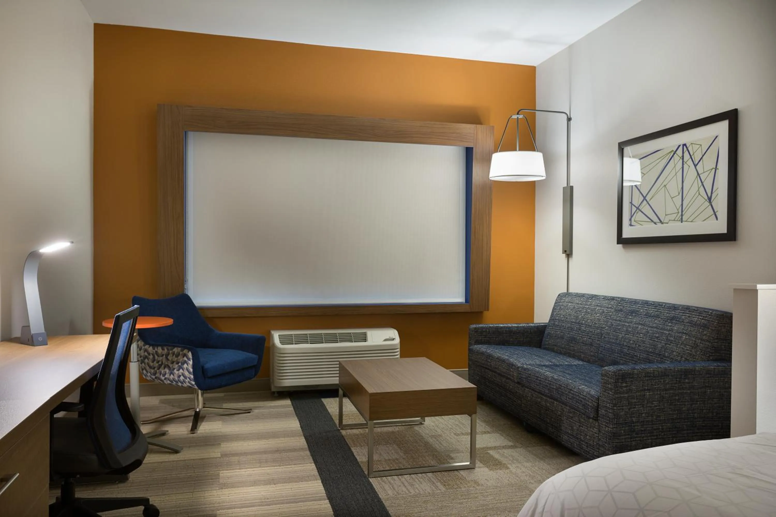 Living room in Holiday Inn Express & Suites - Fayetteville South by IHG