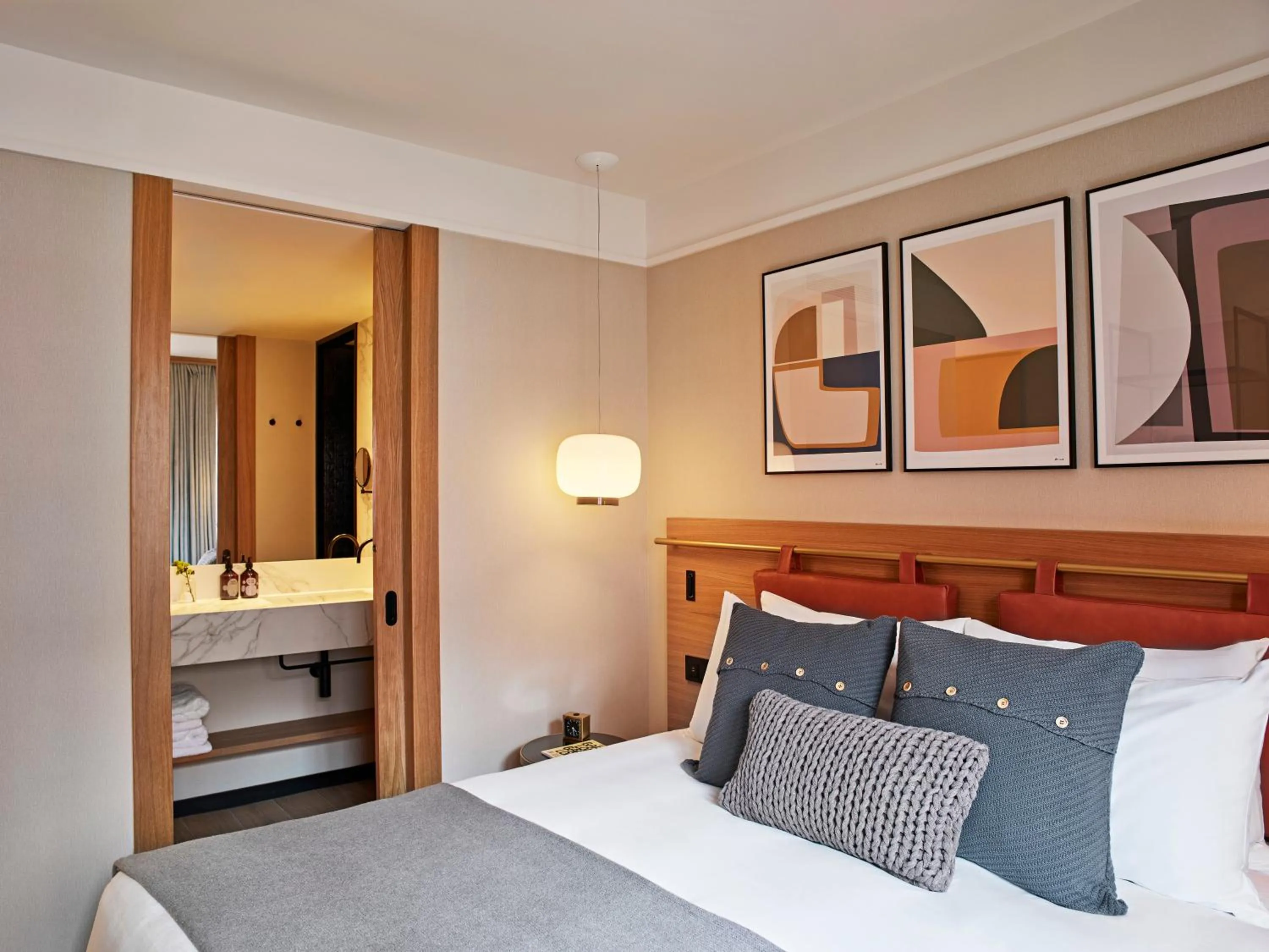 Bed in Kimpton Vividora Hotel by IHG