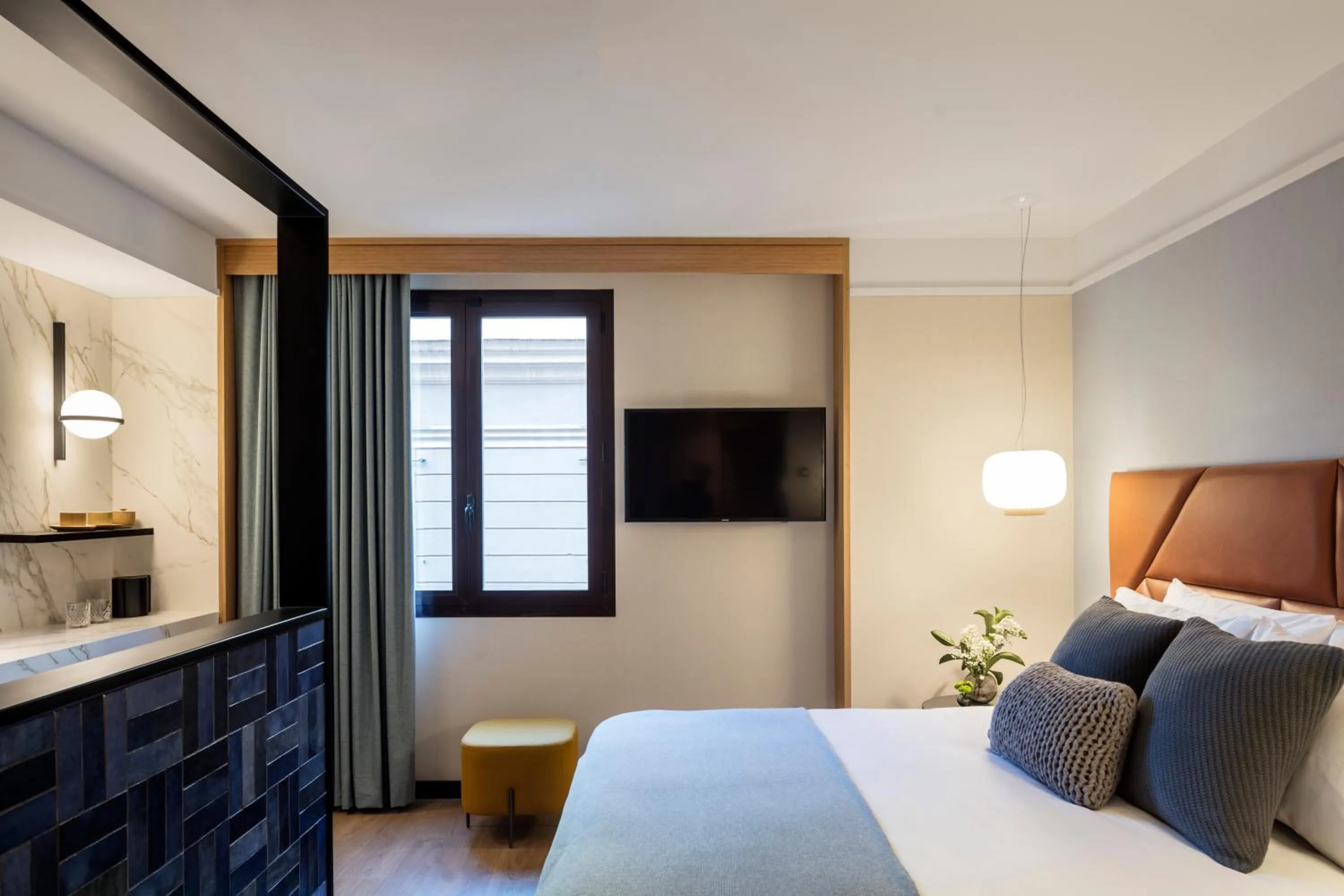 Bed in Kimpton Vividora Hotel by IHG