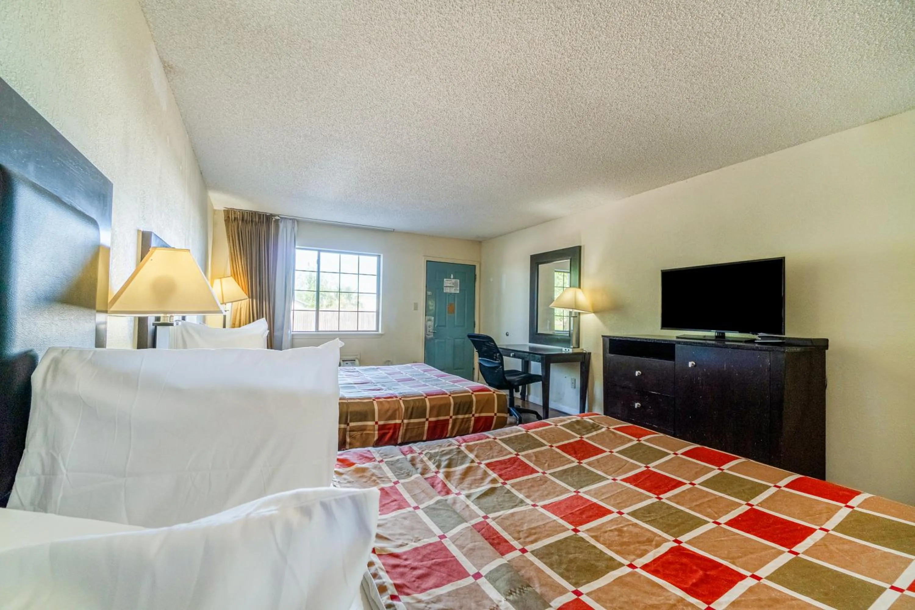 Bed in Executive Inn Port Lavaca by OYO