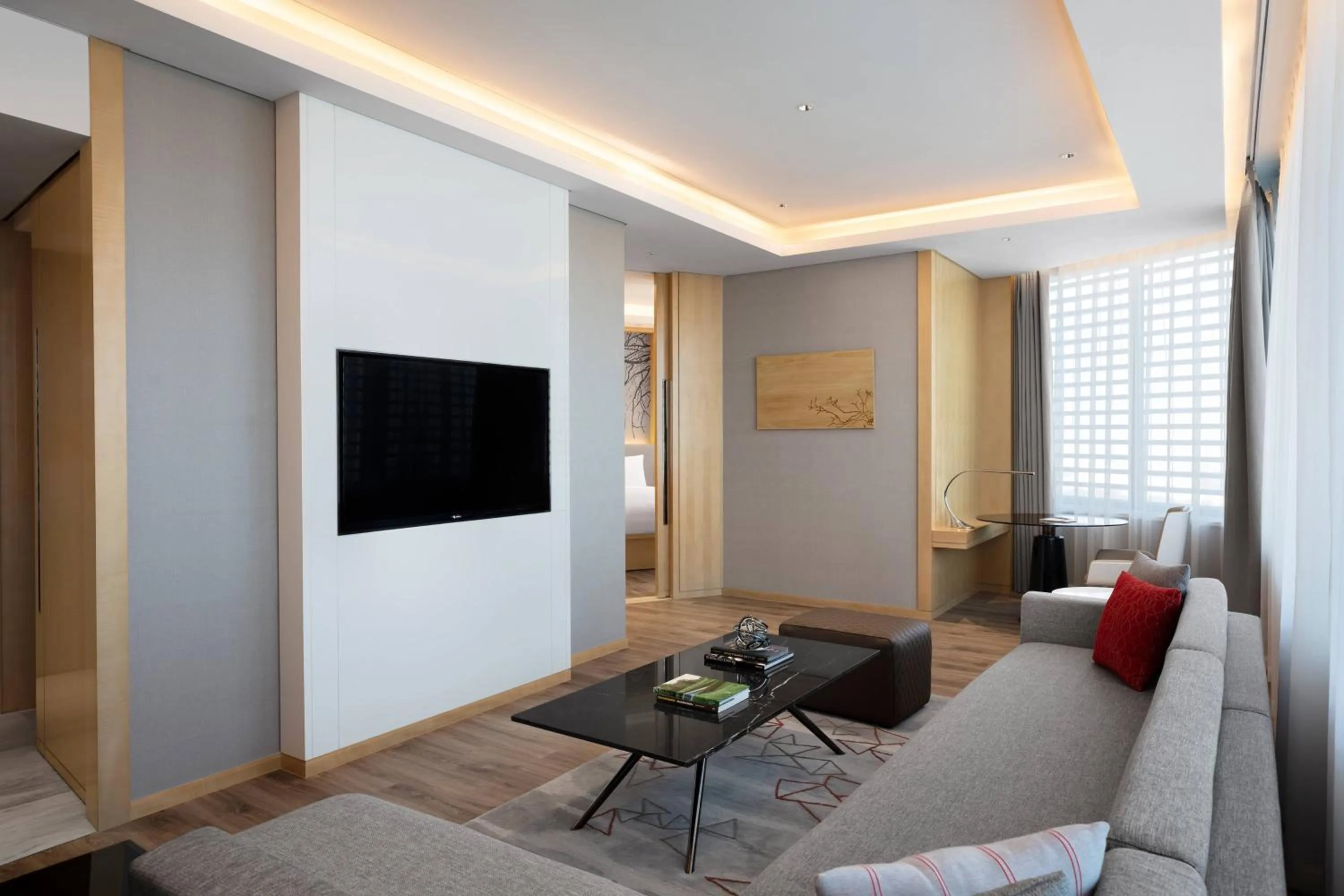 Living room in Courtyard by Marriott Shanghai Songjiang