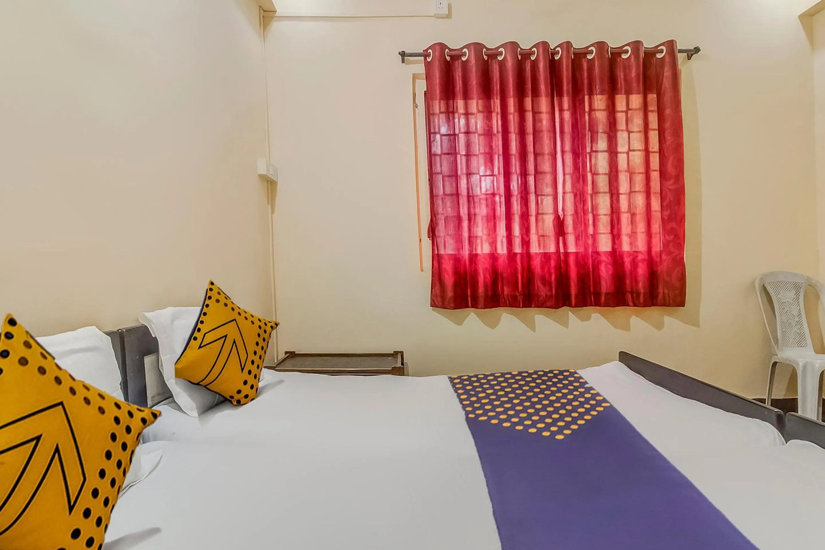 Bedroom in Hotel O New Ushakal Lodging & Boarding