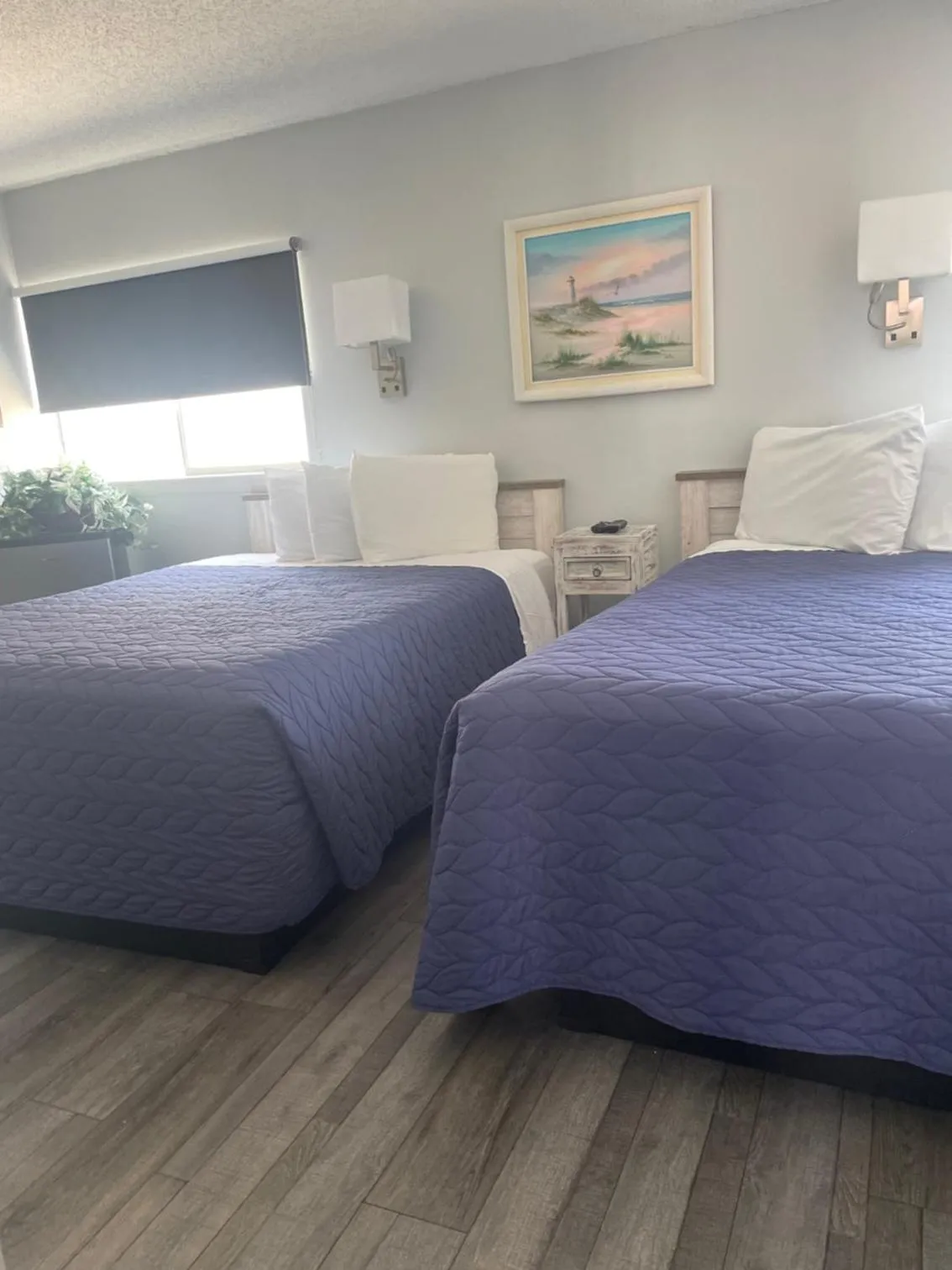 Bed in Acacia Beachfront Resort