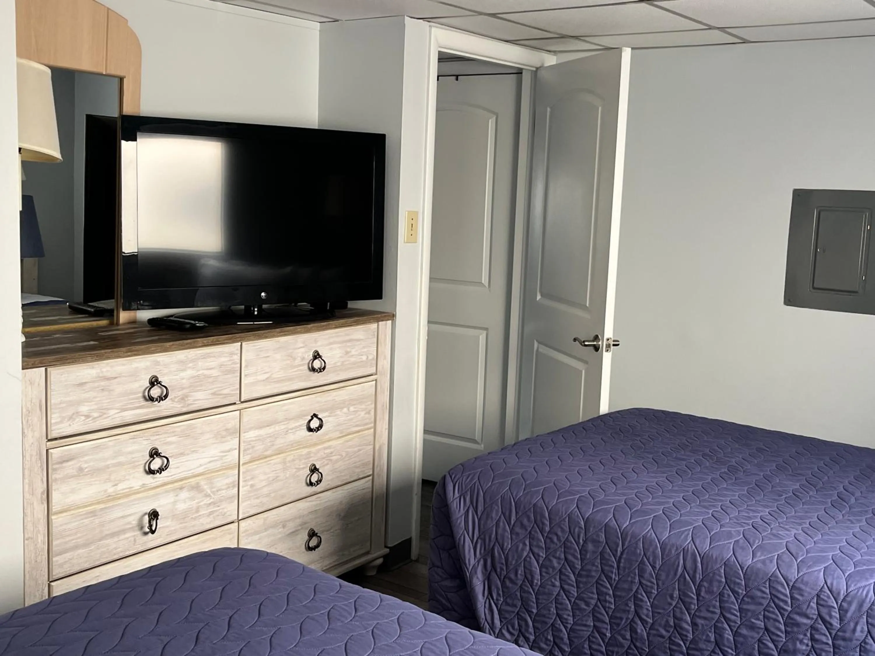 Bed in Acacia Beachfront Resort