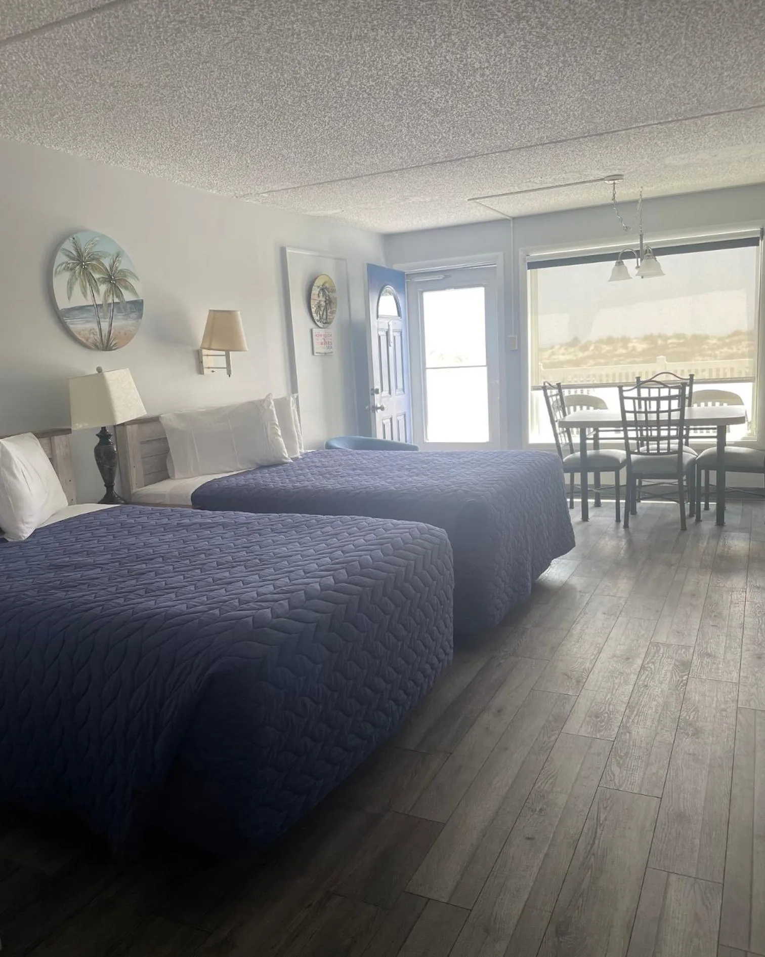 Bed in Acacia Beachfront Resort