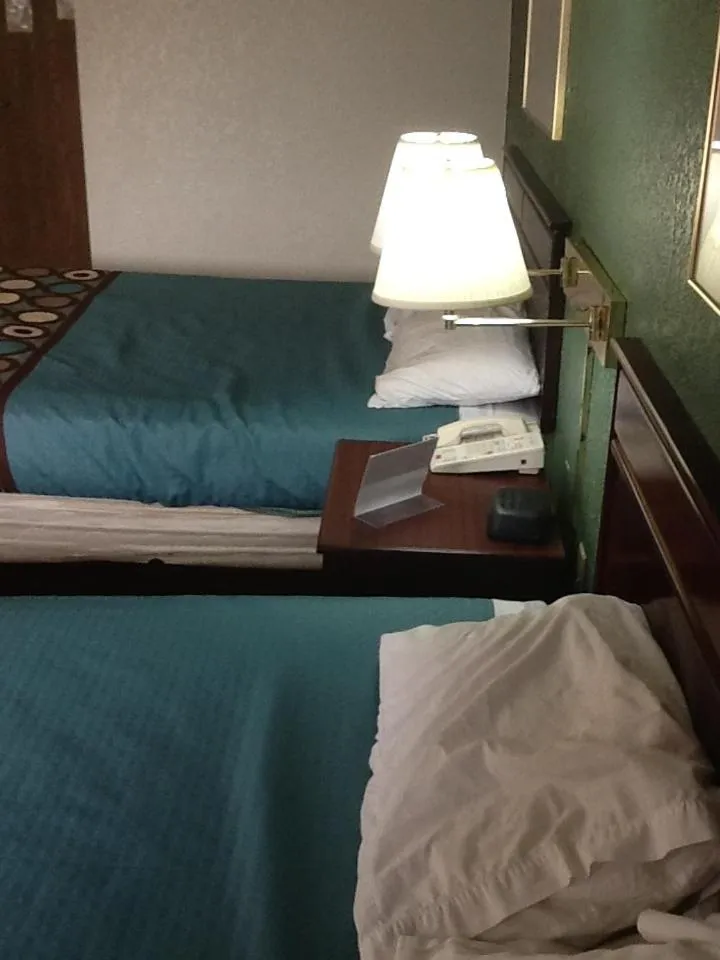 Bed in Super 8 by Wyndham Kennett