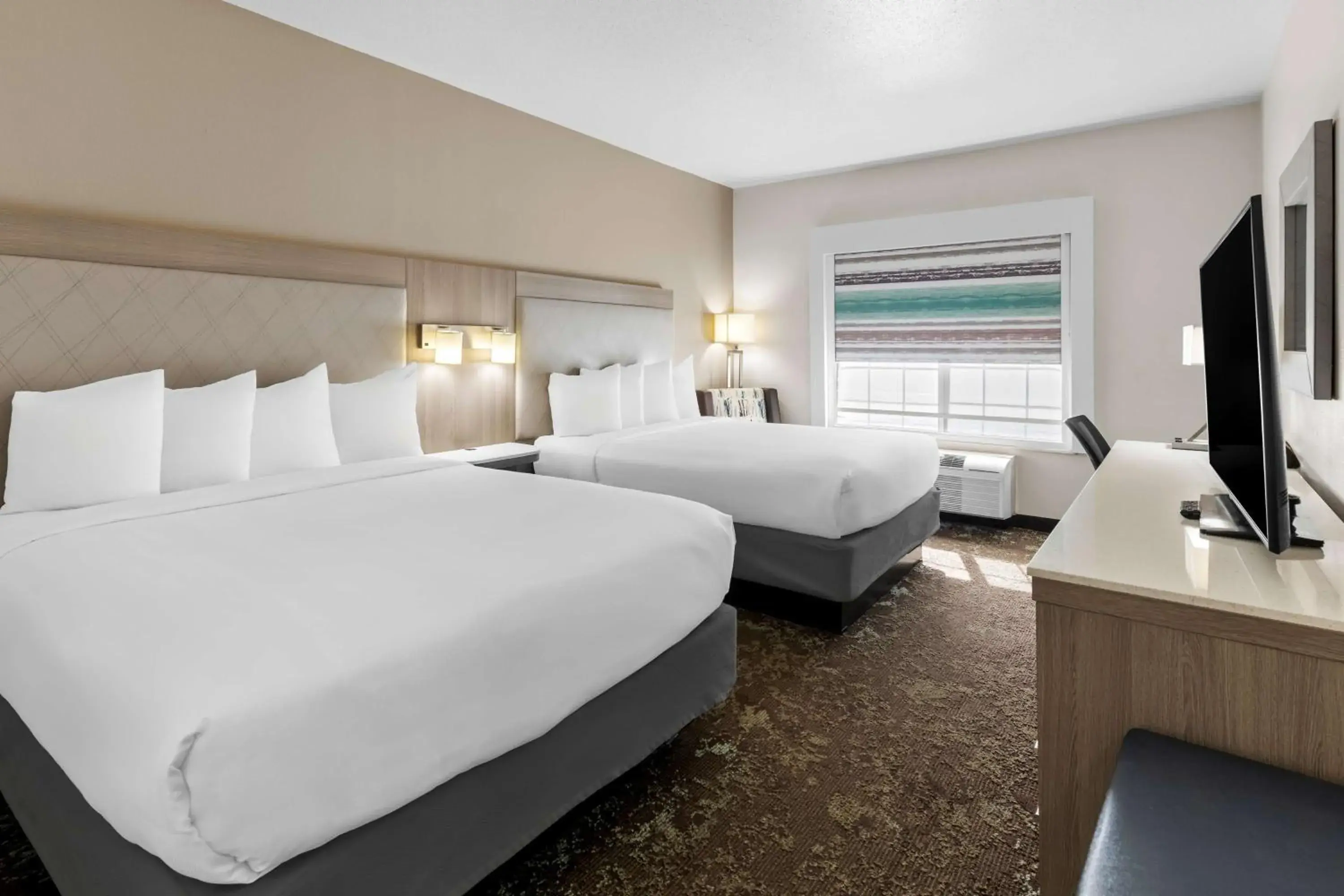 Queen Room with Two Queen Beds in Best Western Worlds Of Fun Queen Room with Two Queen Beds in Best Western Worlds Of Fun