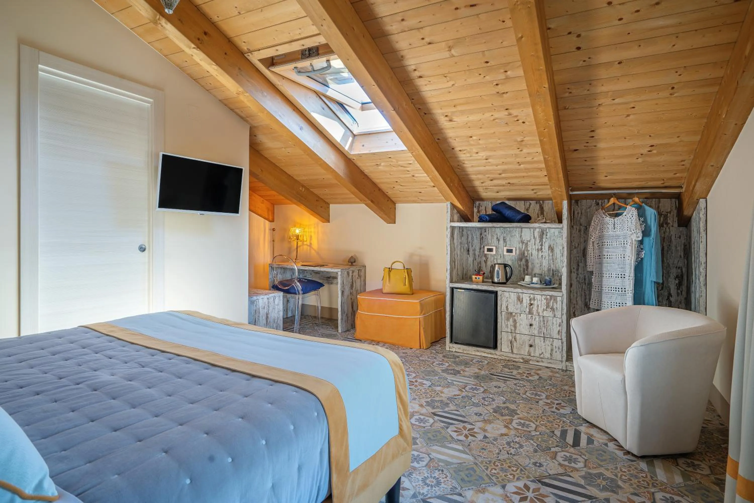 Bed in DON GIULIO LUXURY ROOMS jacuzzi