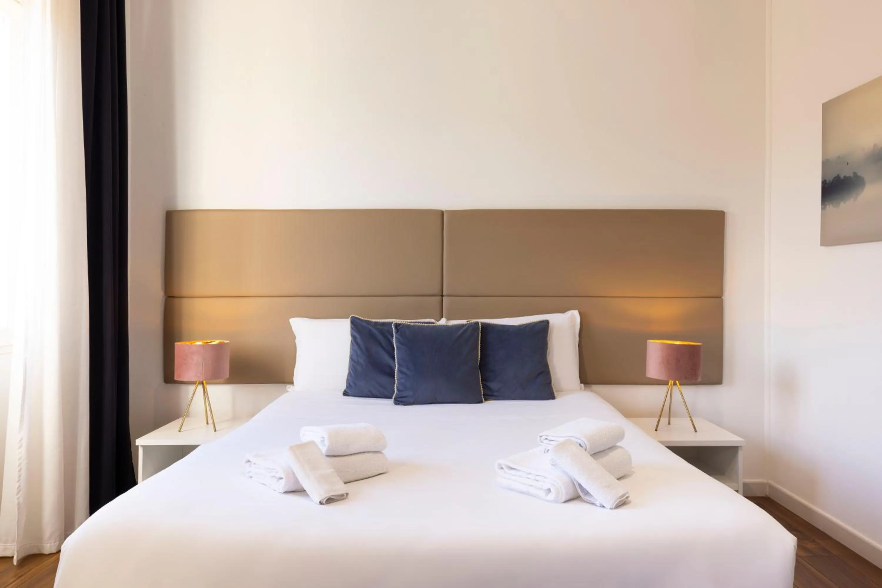 Bed in Mapi’s Rooms