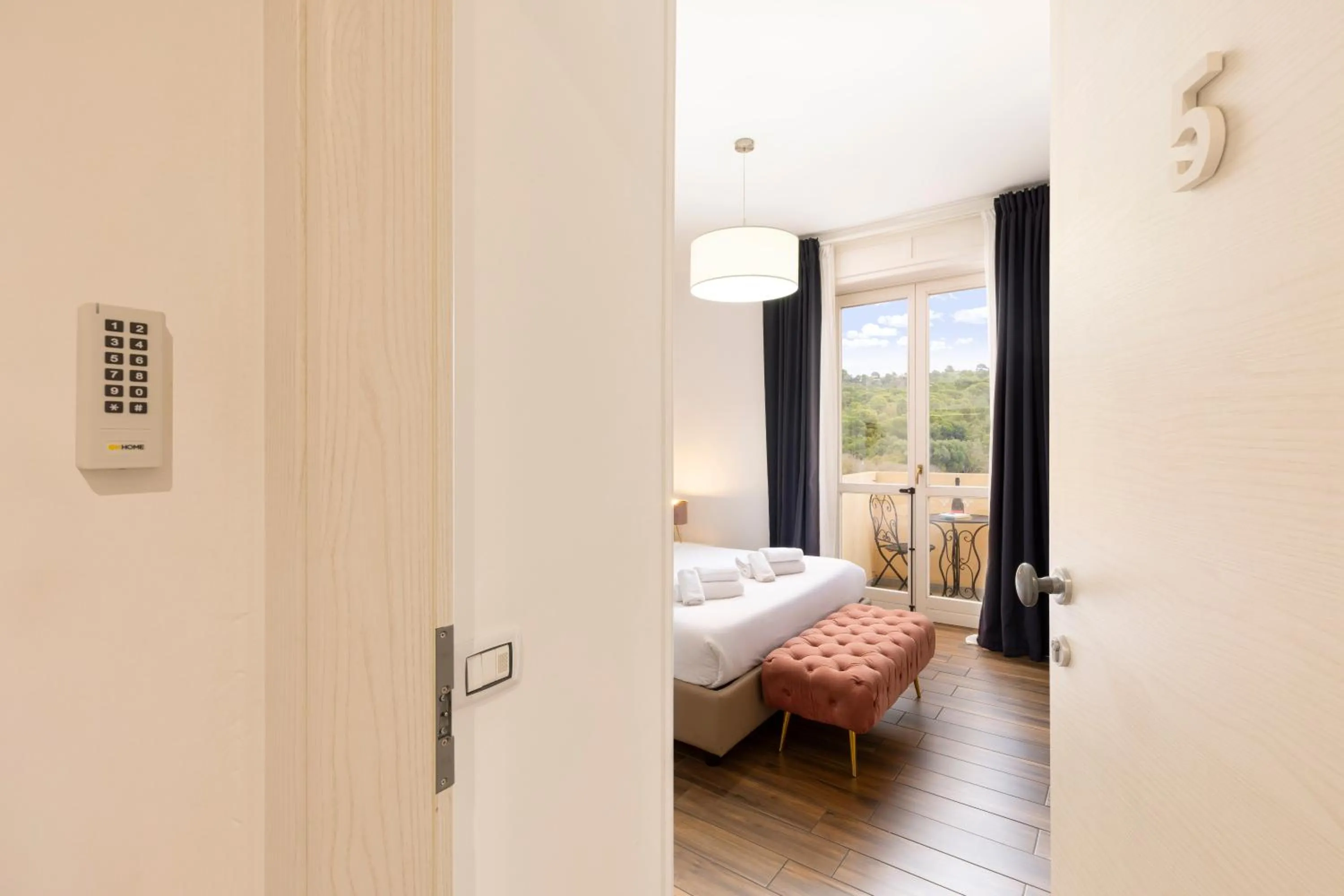 Bed in Mapi’s Rooms