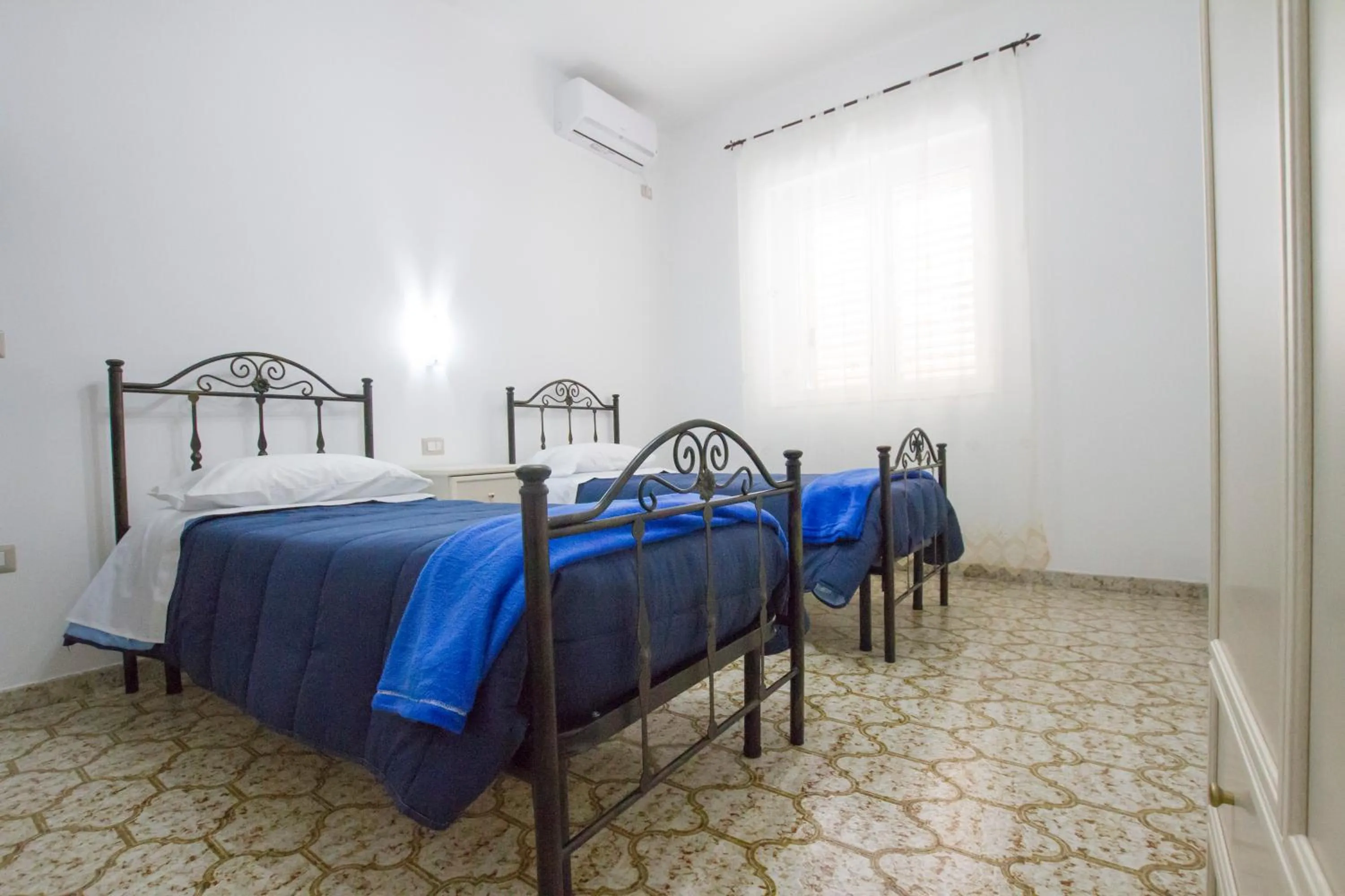 Bed in Le Maschere B&B