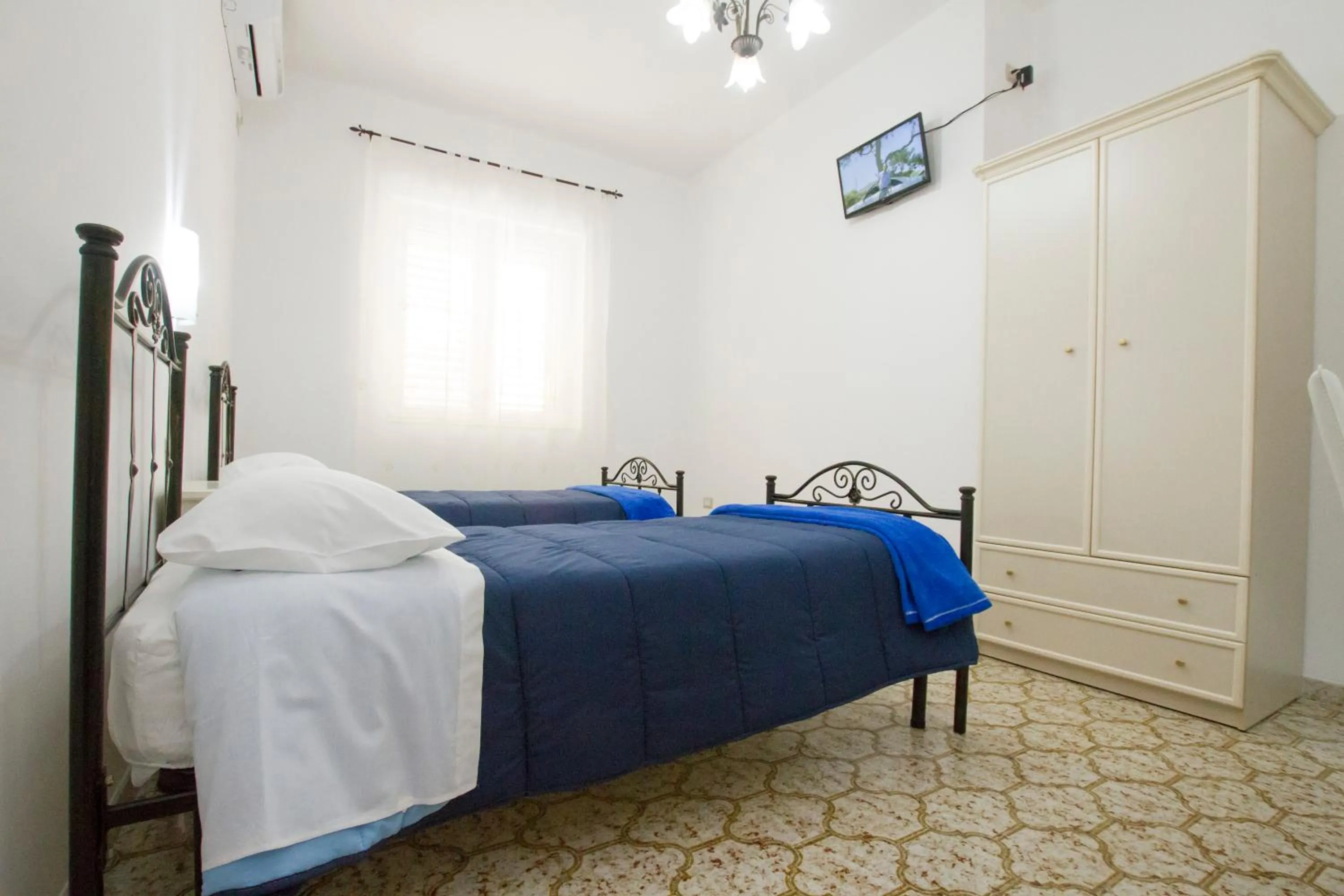 Bed in Le Maschere B&B