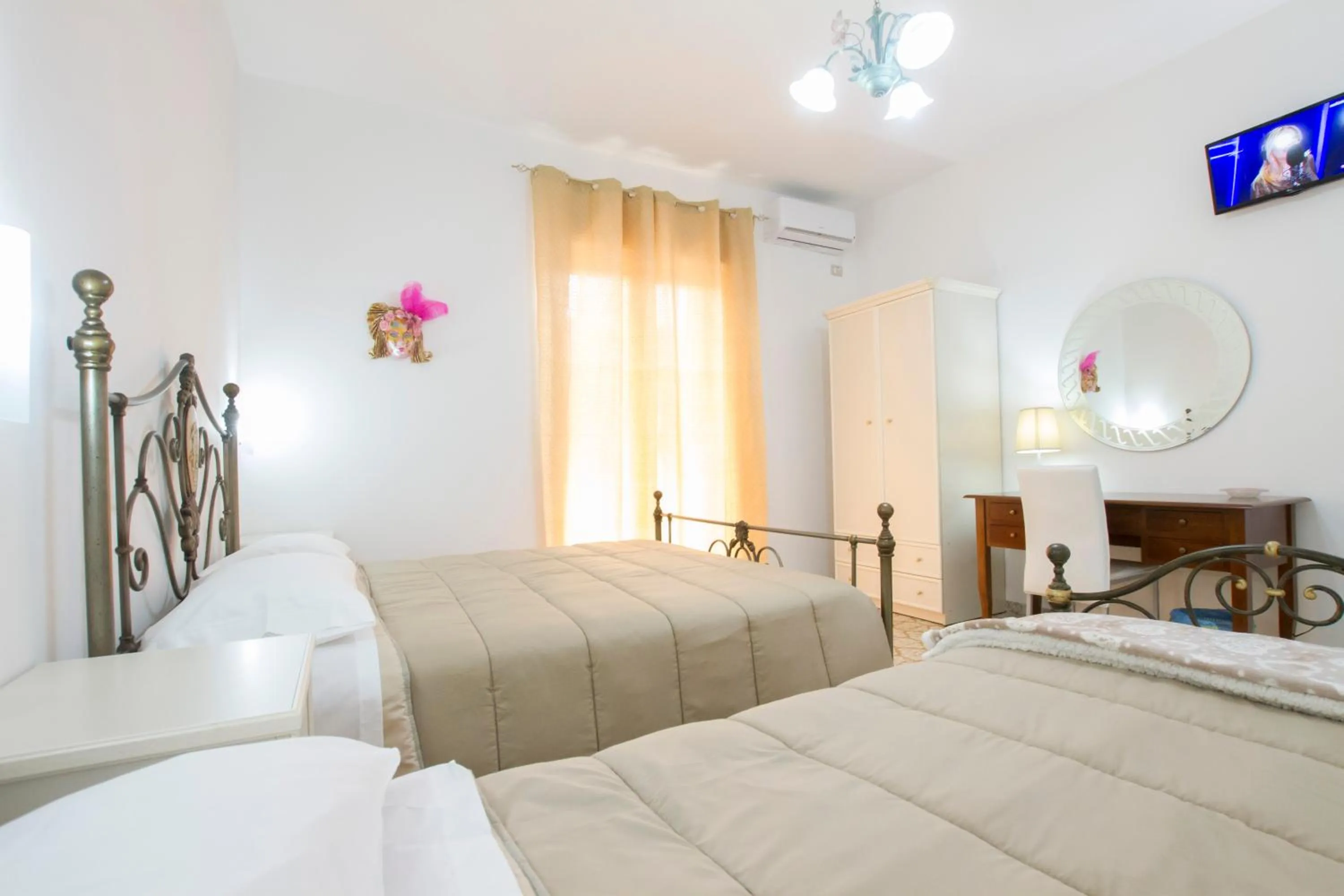 Bed in Le Maschere B&B