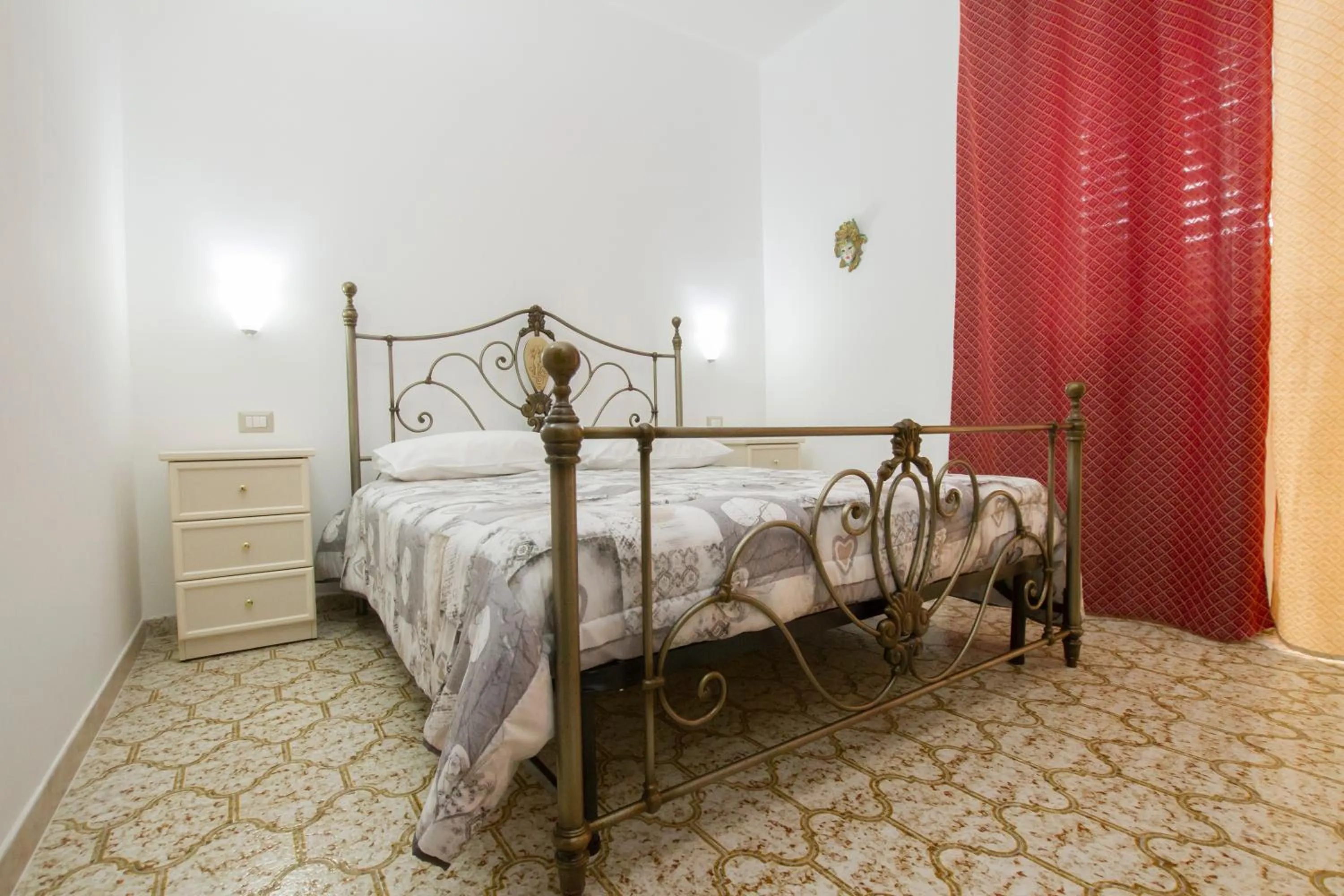 Bed in Le Maschere B&B