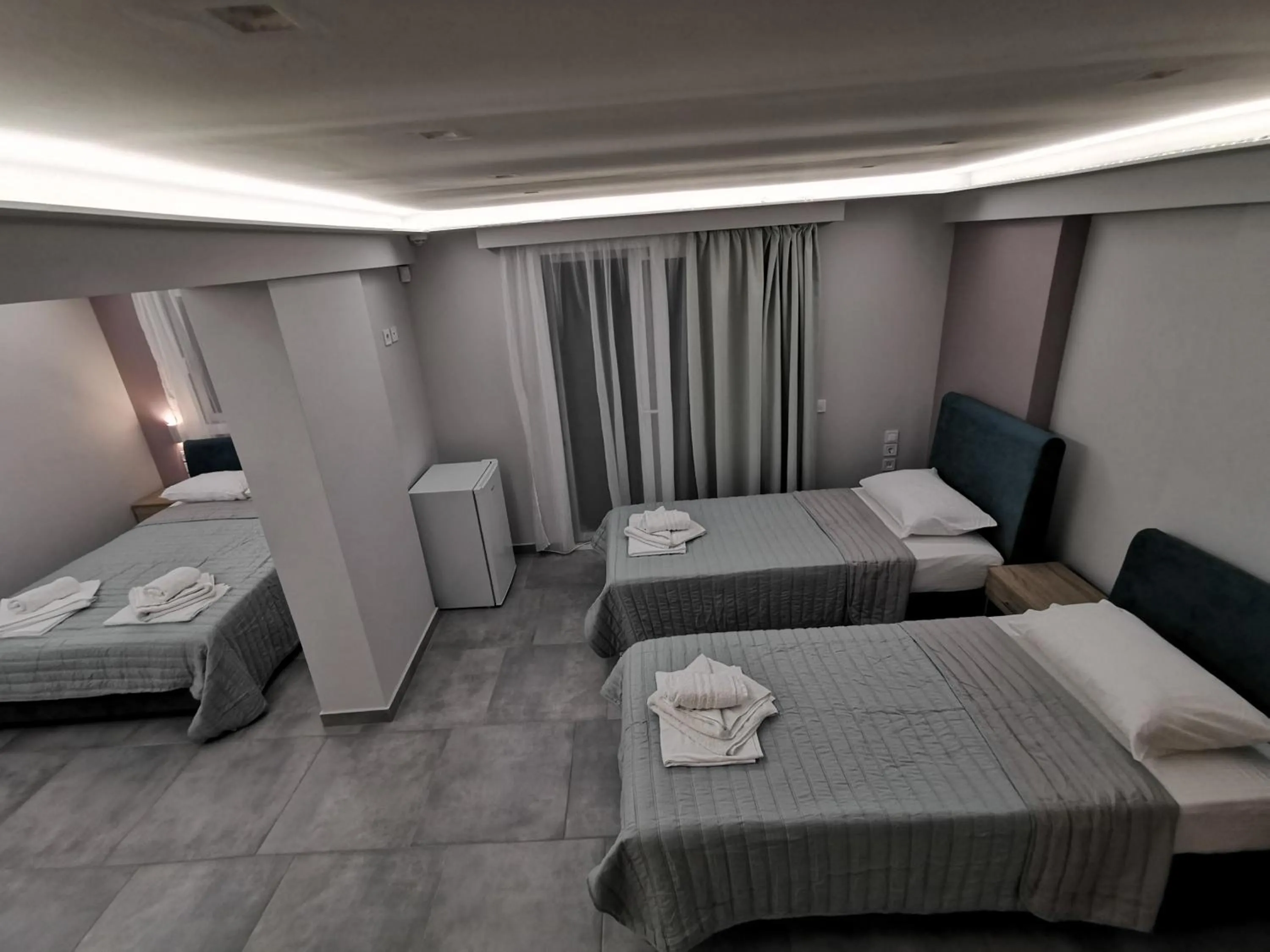 Bed in 3 Island View Hotel