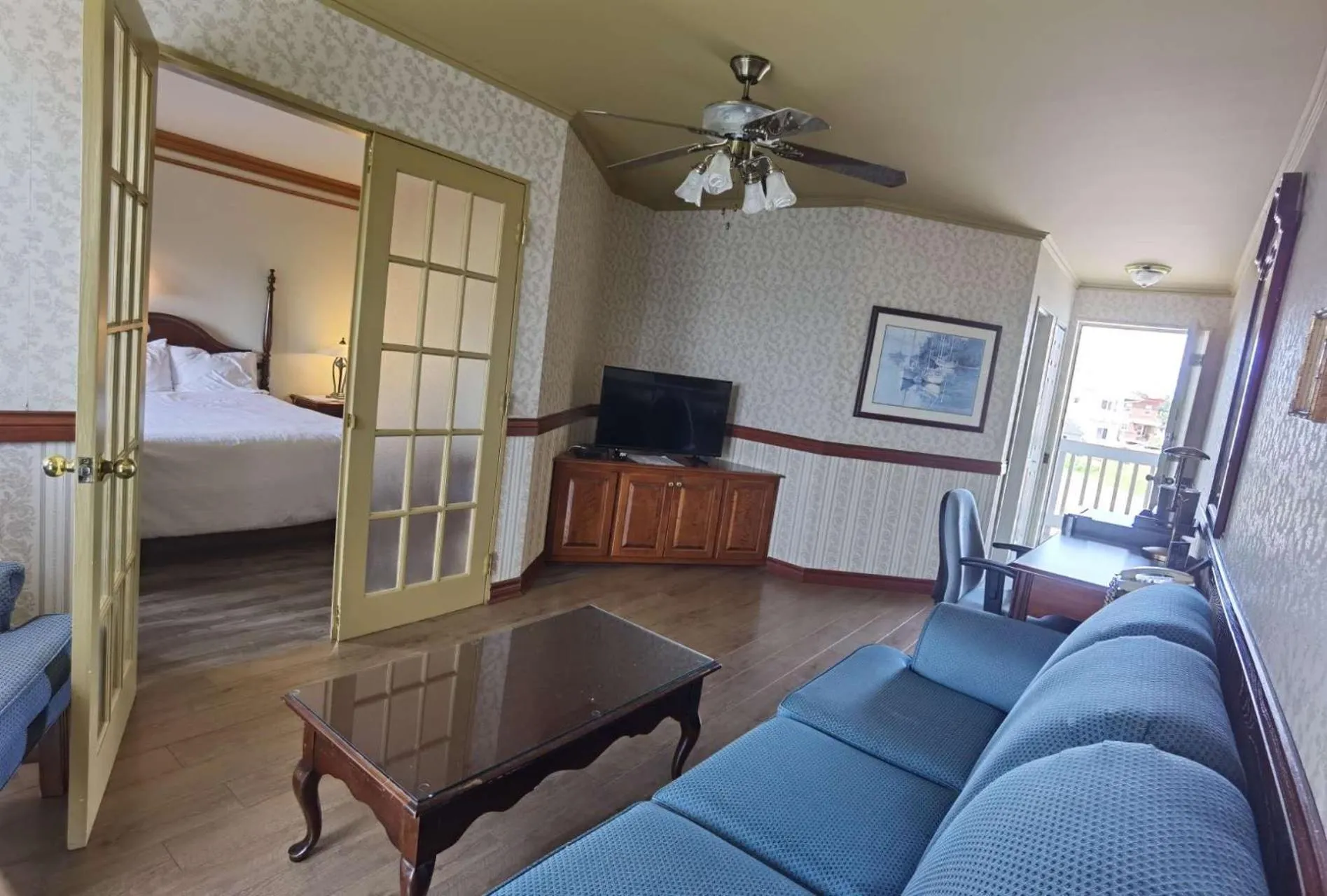 Bed in Motel Grand-Pré Inc