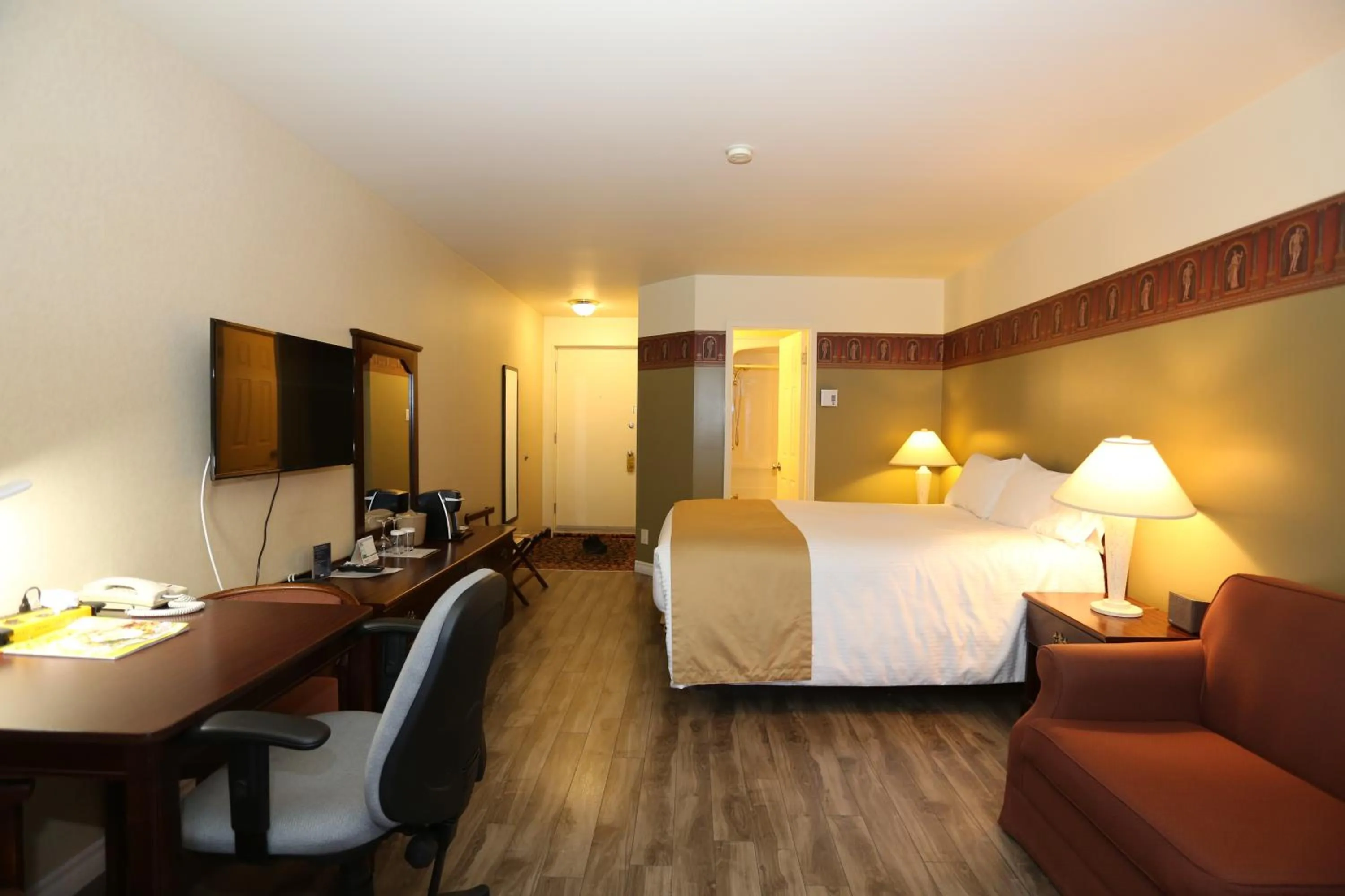 Bed in Motel Grand-Pré Inc