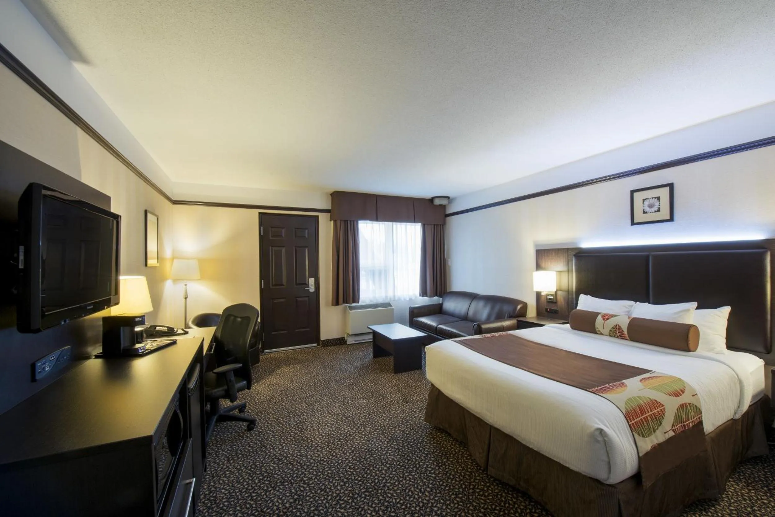 Bedroom, Bed in L'Escale Hôtel Suites