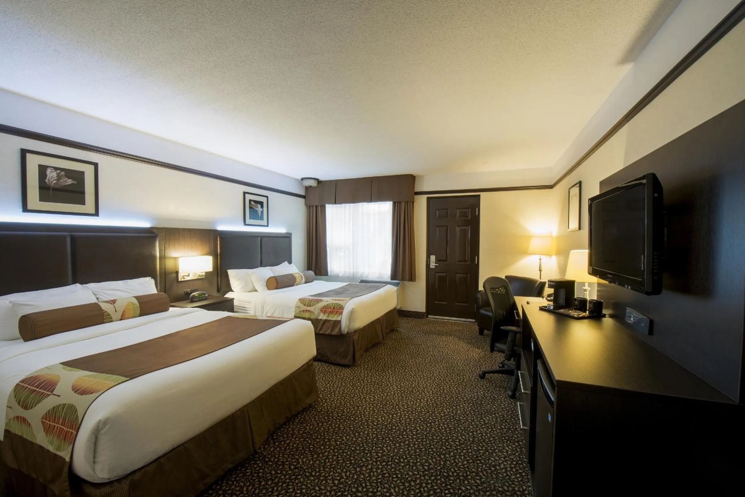 Bedroom, Bed in L'Escale Hôtel Suites