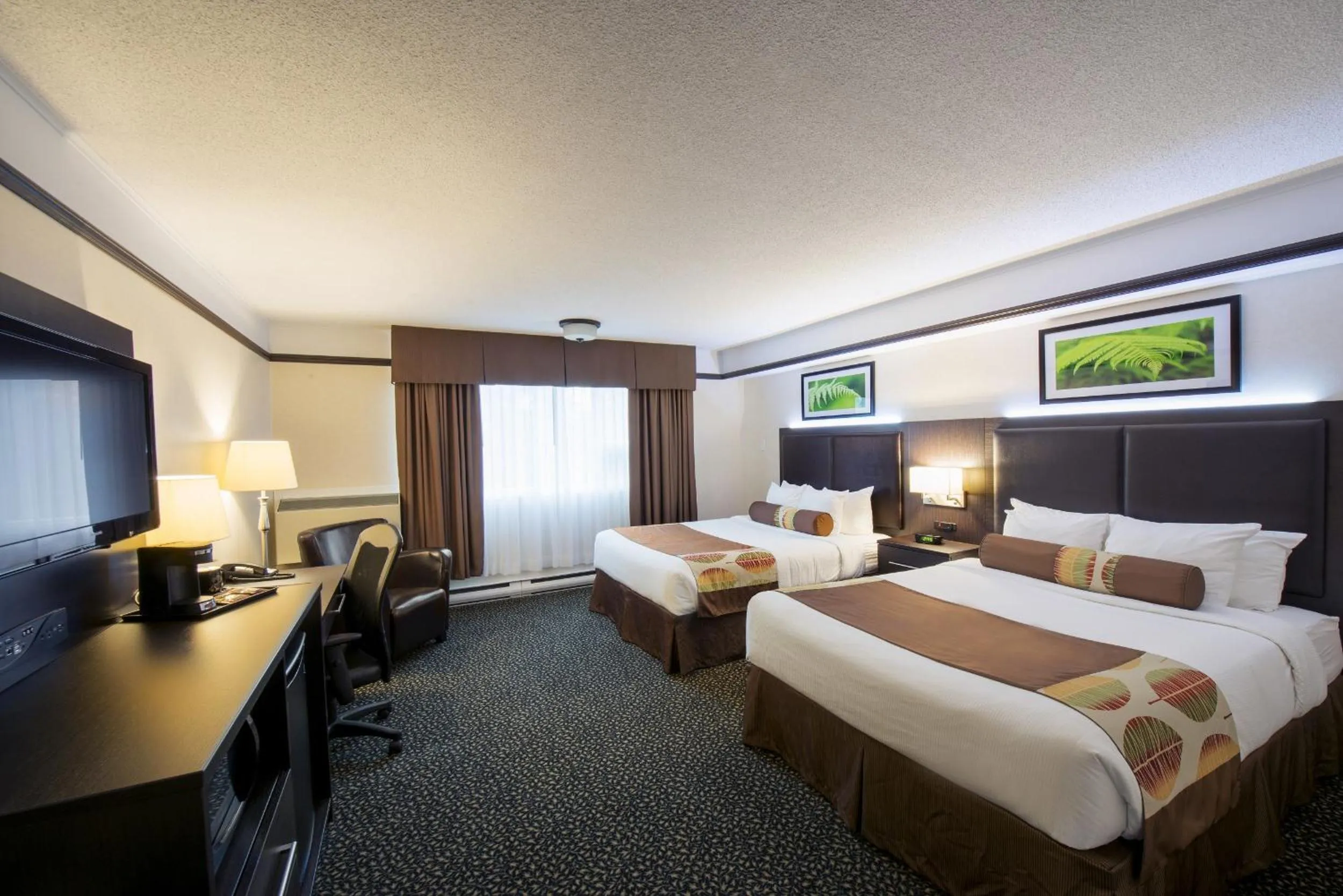 Bedroom, Bed in L'Escale Hôtel Suites