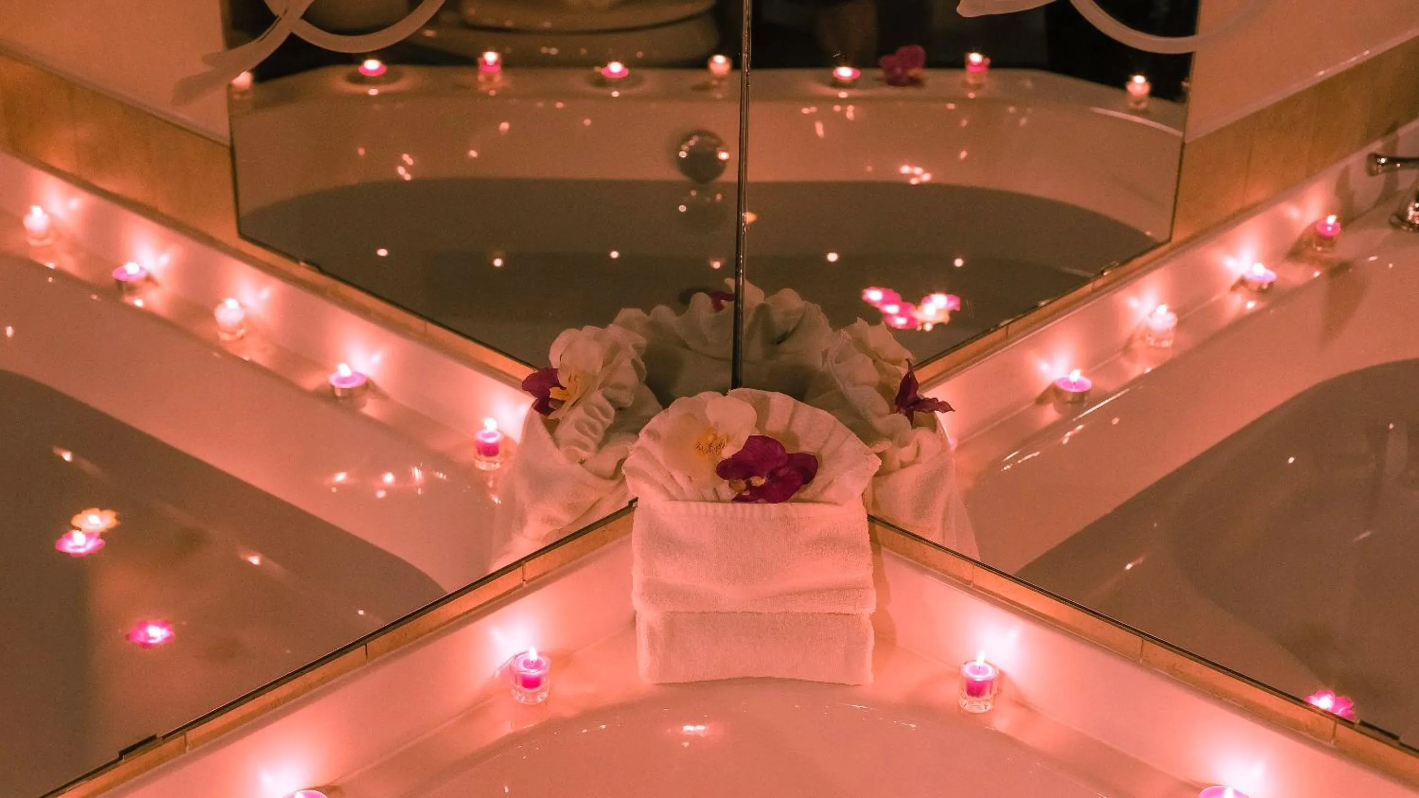 Bathroom in L'Escale Hôtel Suites