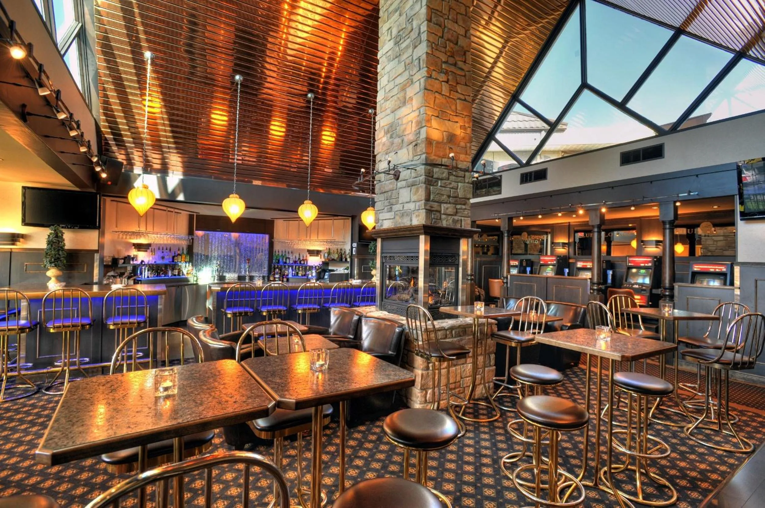 Lounge or bar in L'Escale Hôtel Suites