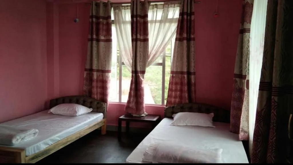 Photo of the whole room, Bed in Rainbow Valley Resort