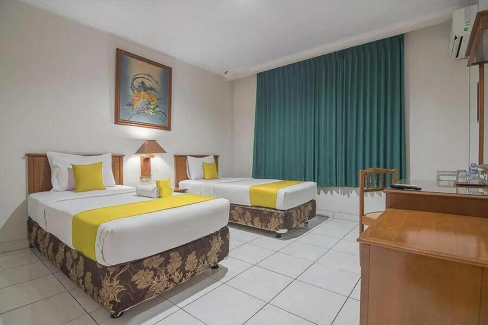 Bed in Hotel Yehezkiel Surapati Mitra RedDoorz