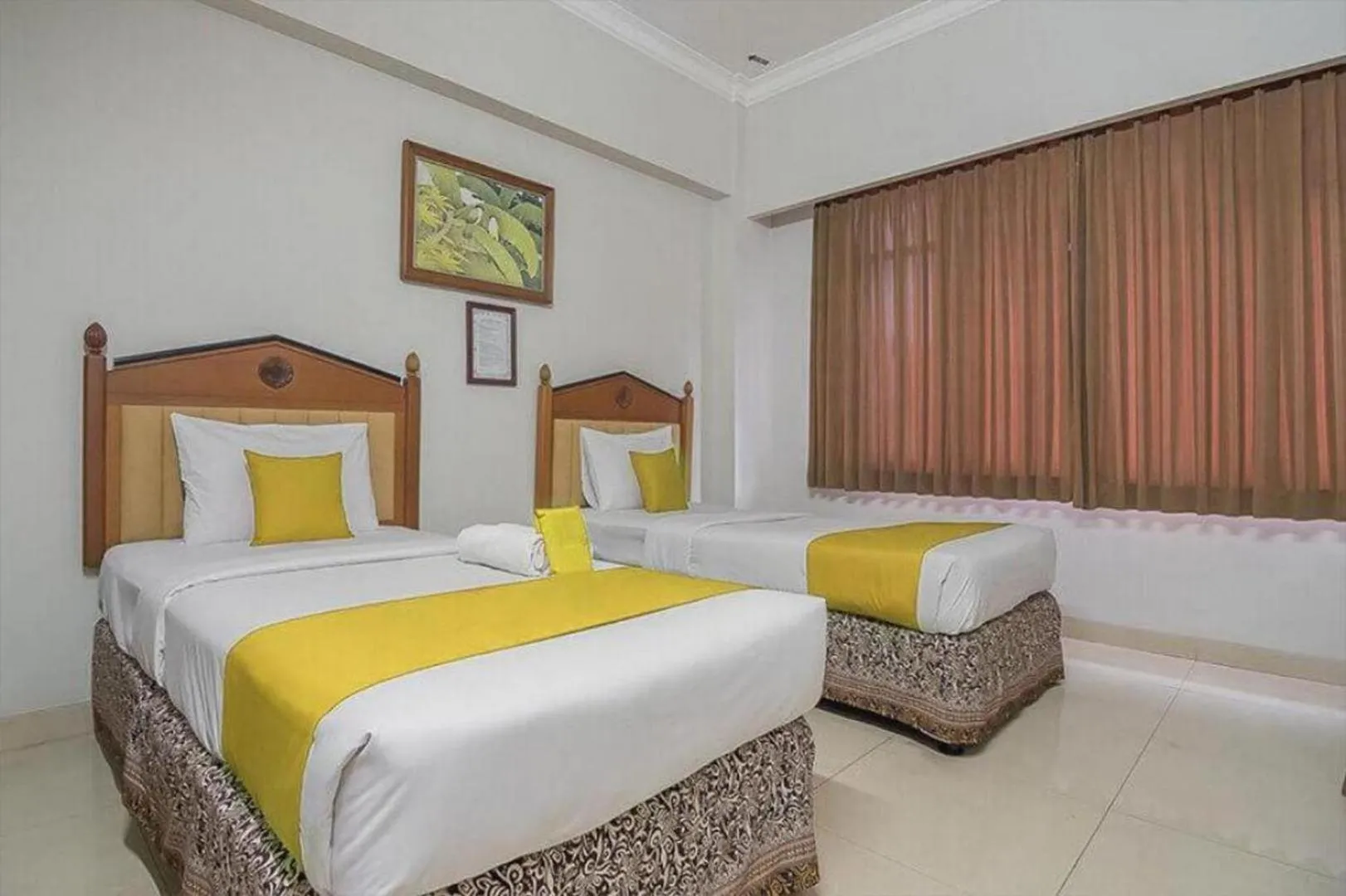 Bed in Hotel Yehezkiel Surapati Mitra RedDoorz