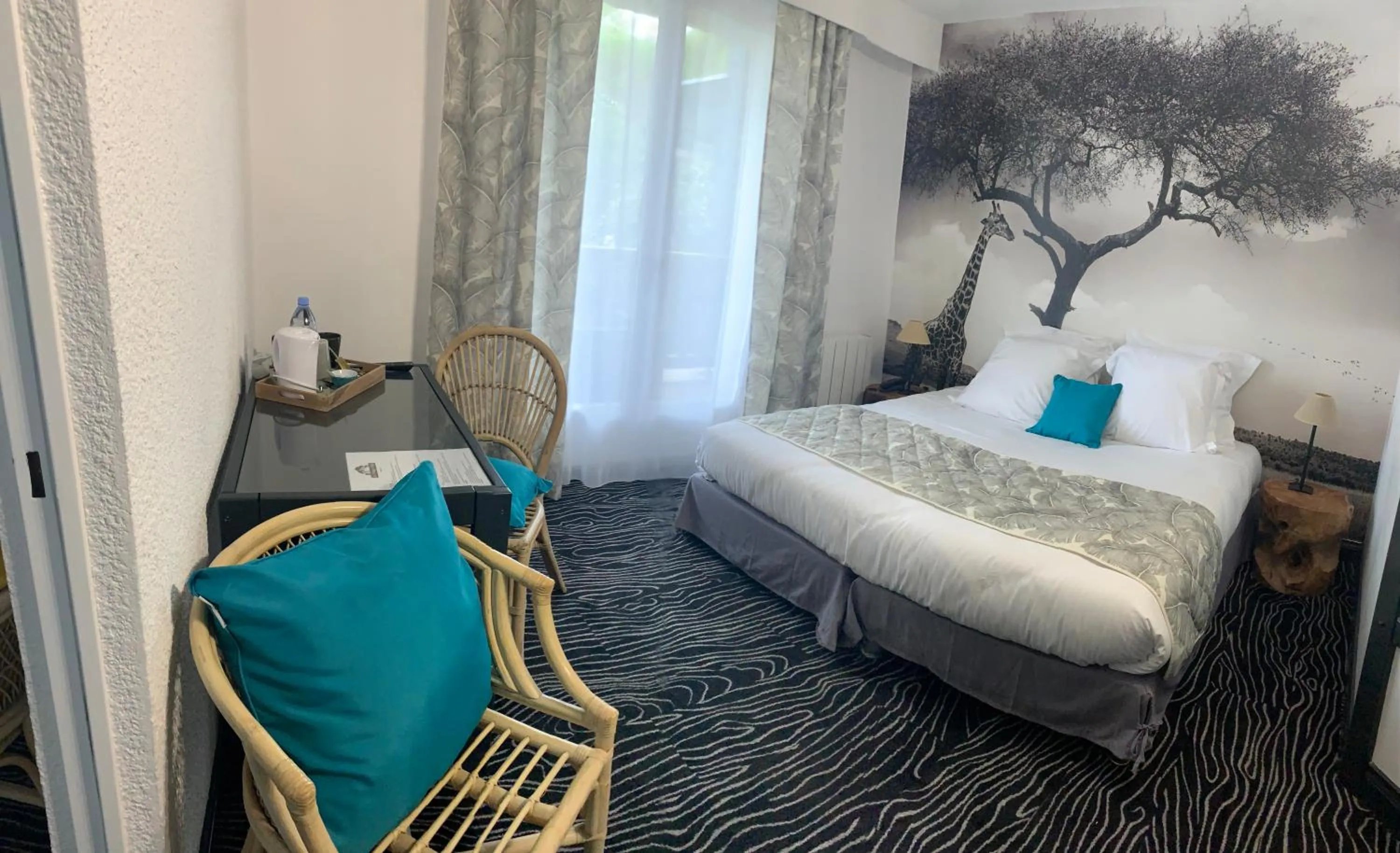 Bedroom in Au Palmyre Hôtel