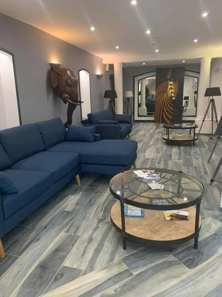 Lobby or reception in Au Palmyre Hôtel