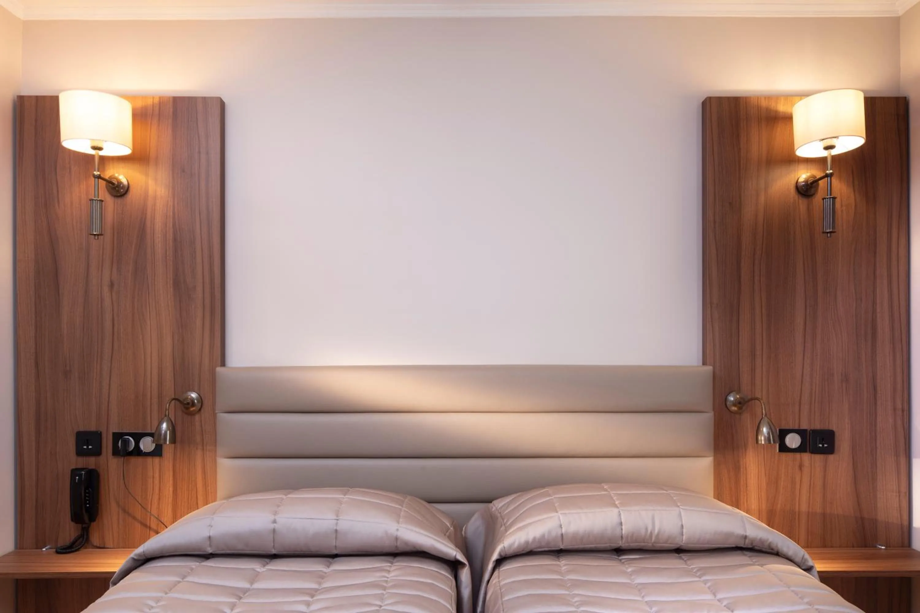 Bed in Hôtel de la Tour Eiffel