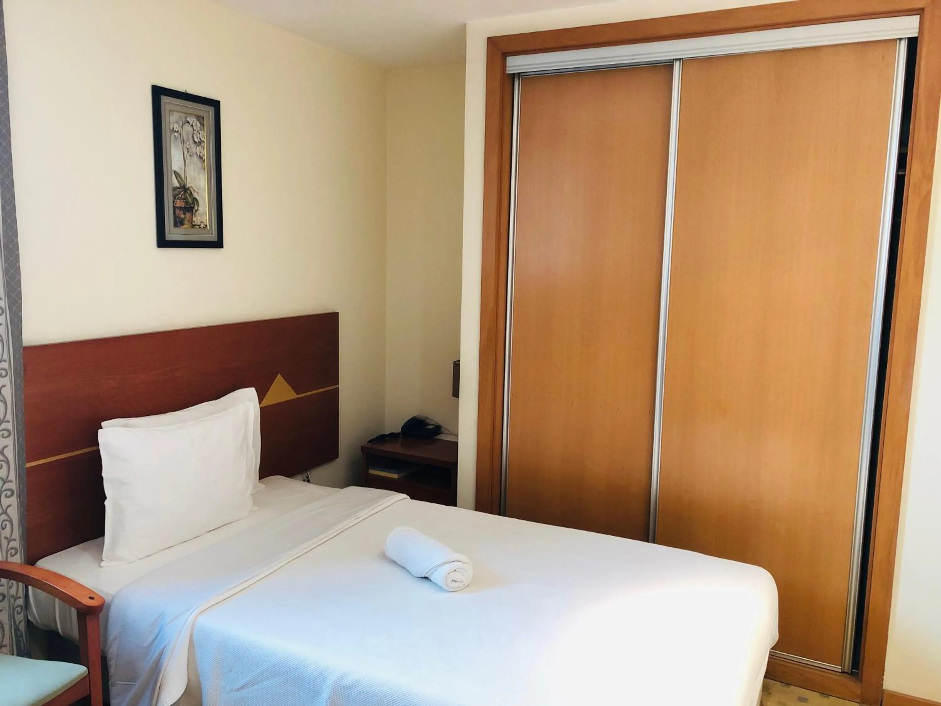 Bedroom in Golden Park Hotel