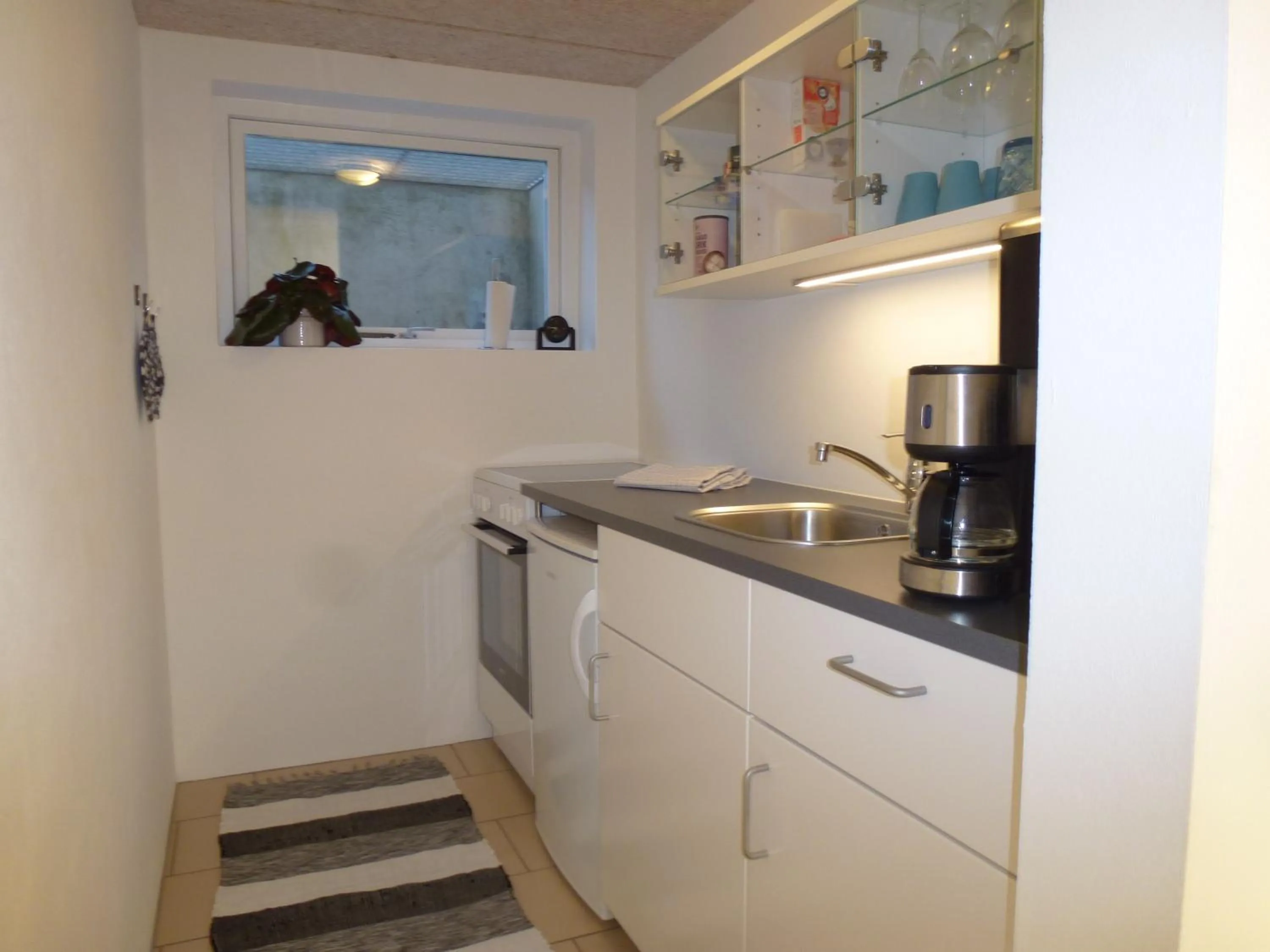 Kitchen or kitchenette in Kastanievejens overnatning
