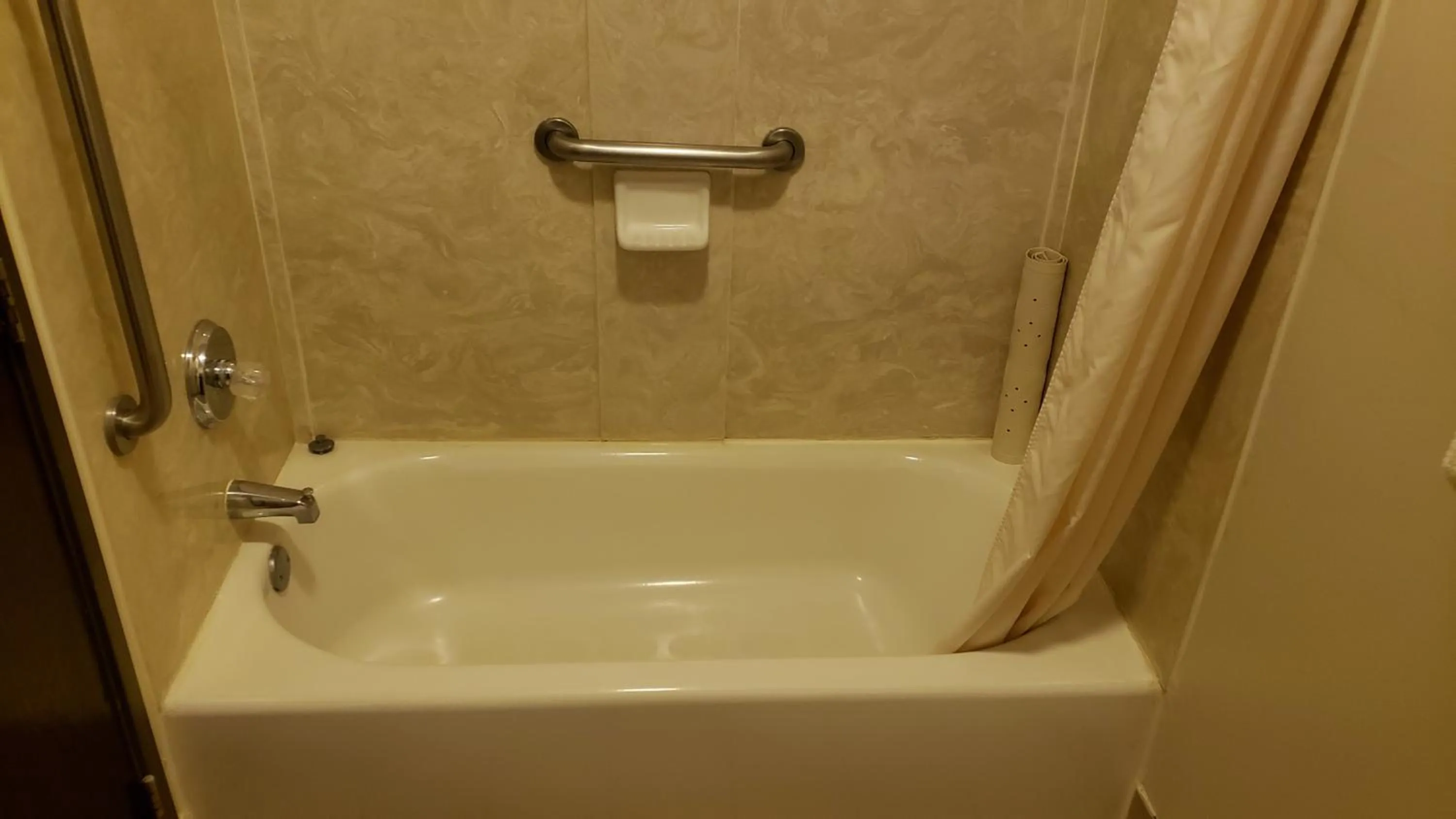 Bathroom in Travelodge by Wyndham Carlsbad NM