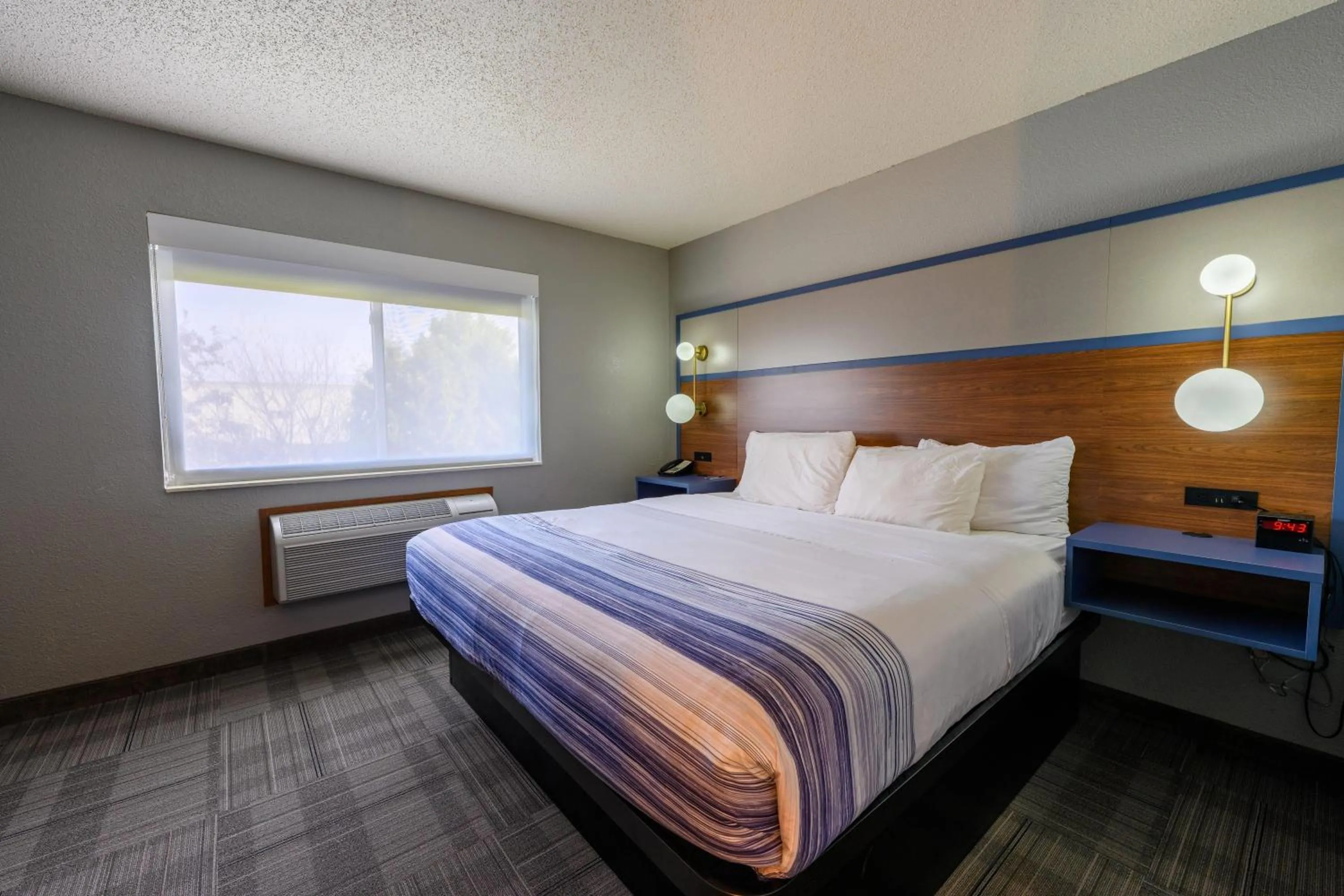 Photo of the whole room, Bed in AmericInn by Wyndham Monroe