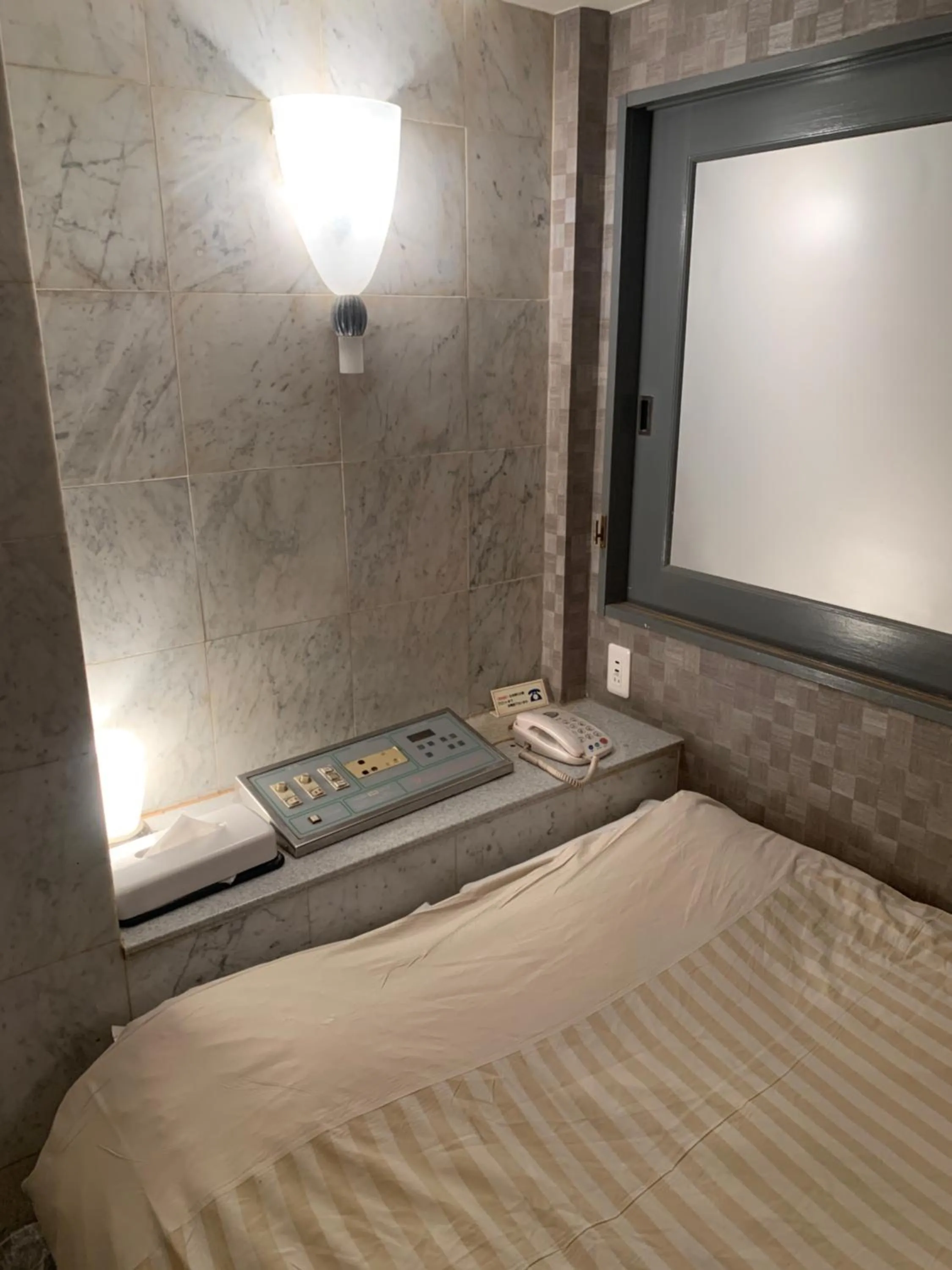 Bed in City Hotel Southern Cross