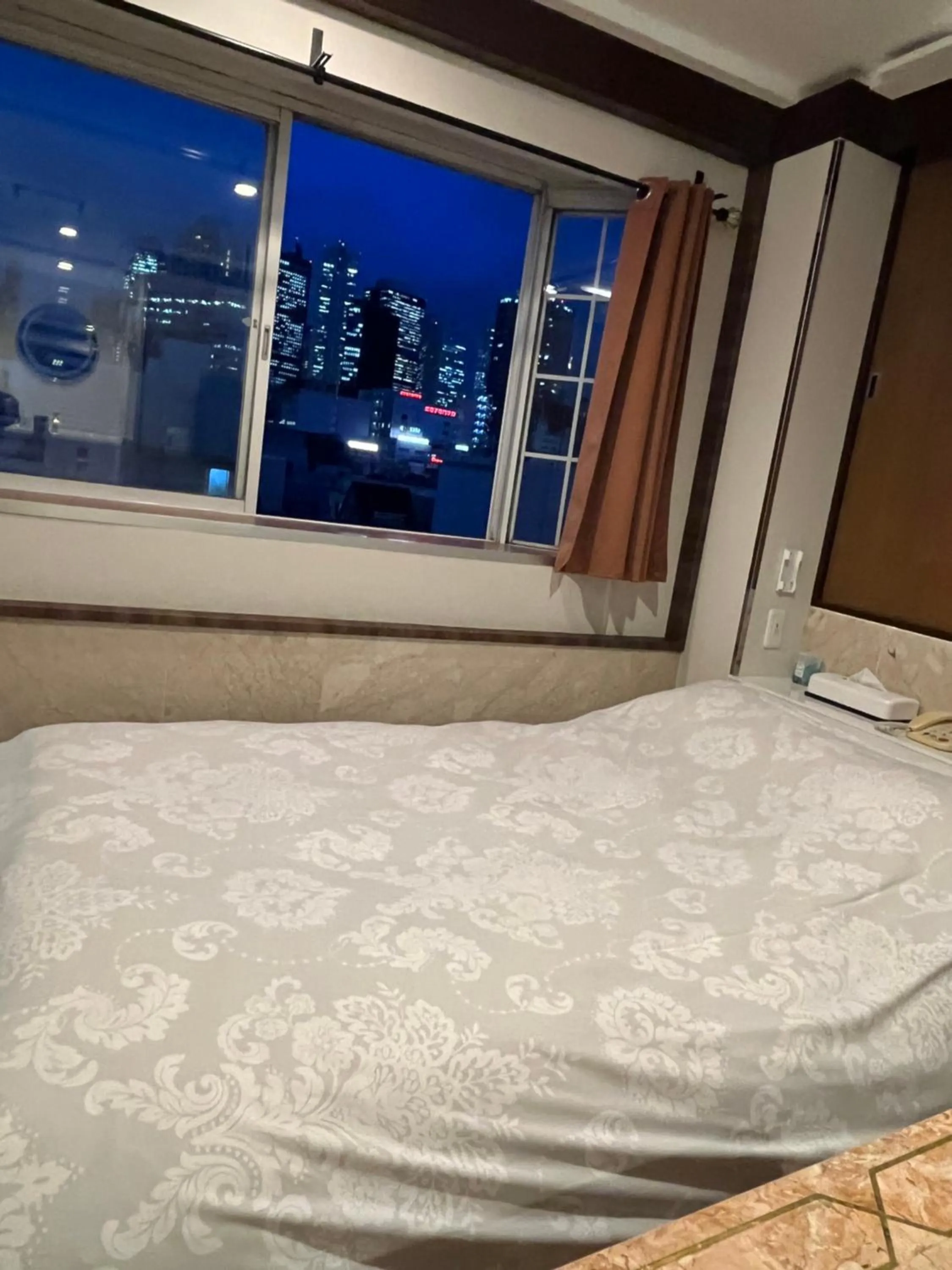 Bed in City Hotel Southern Cross