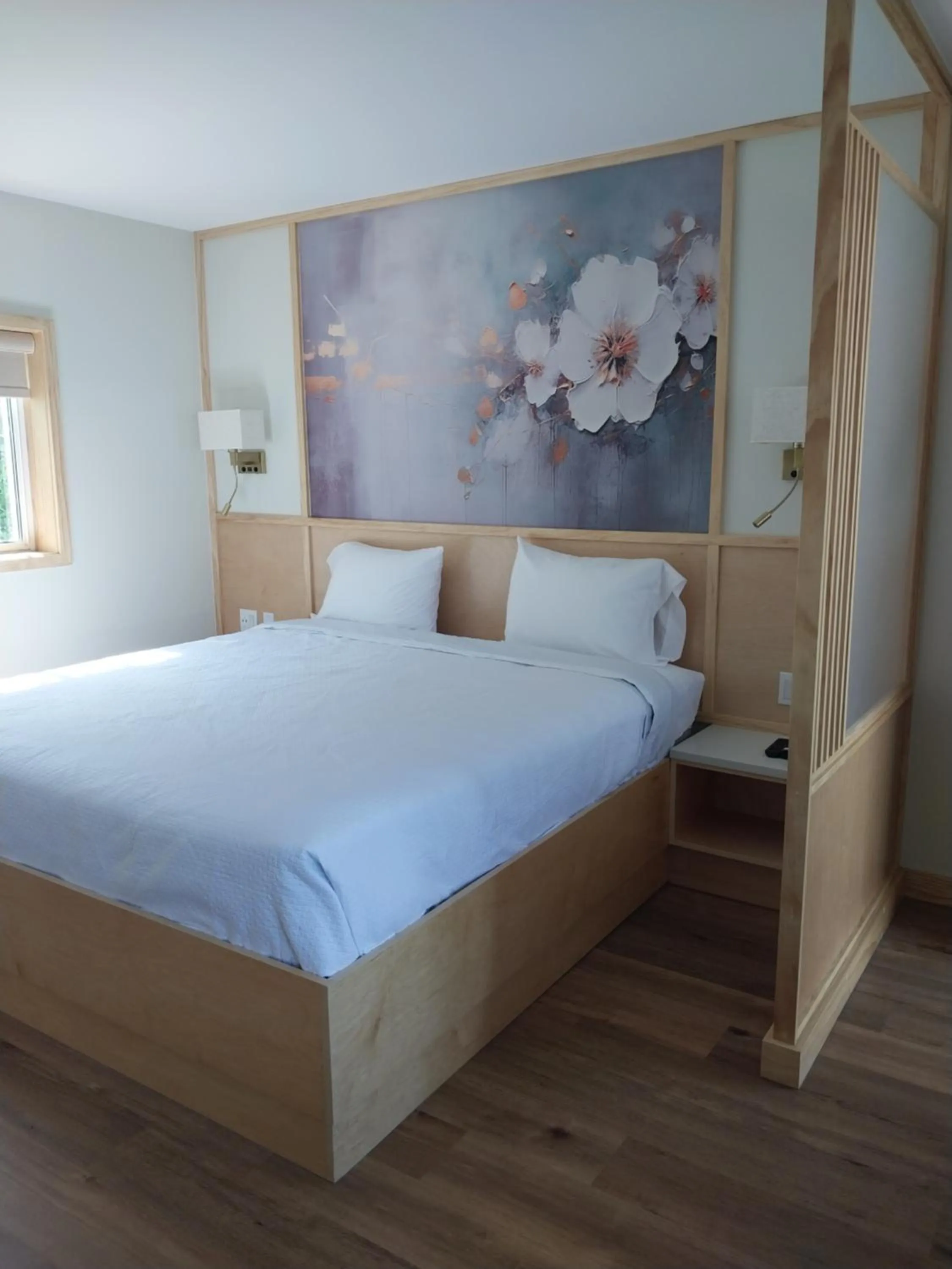 Bed in Greenview Inn Riverhead