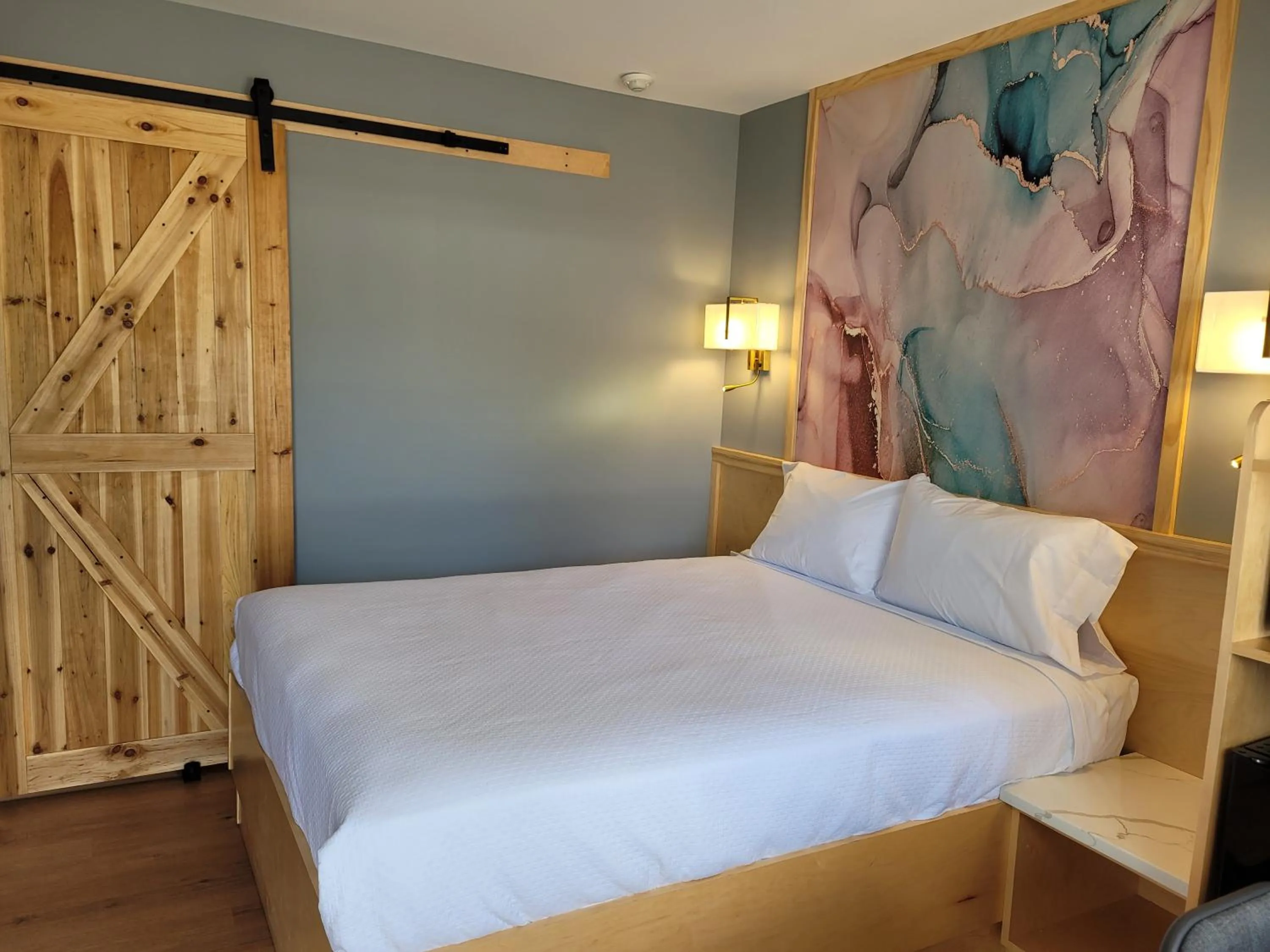 Bed in Greenview Inn Riverhead