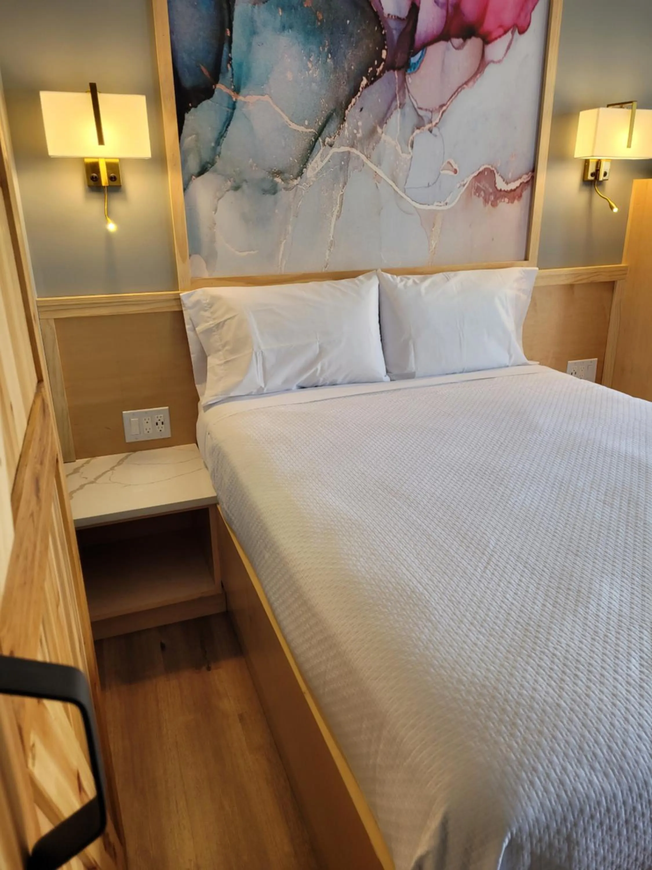 Bed in Greenview Inn Riverhead