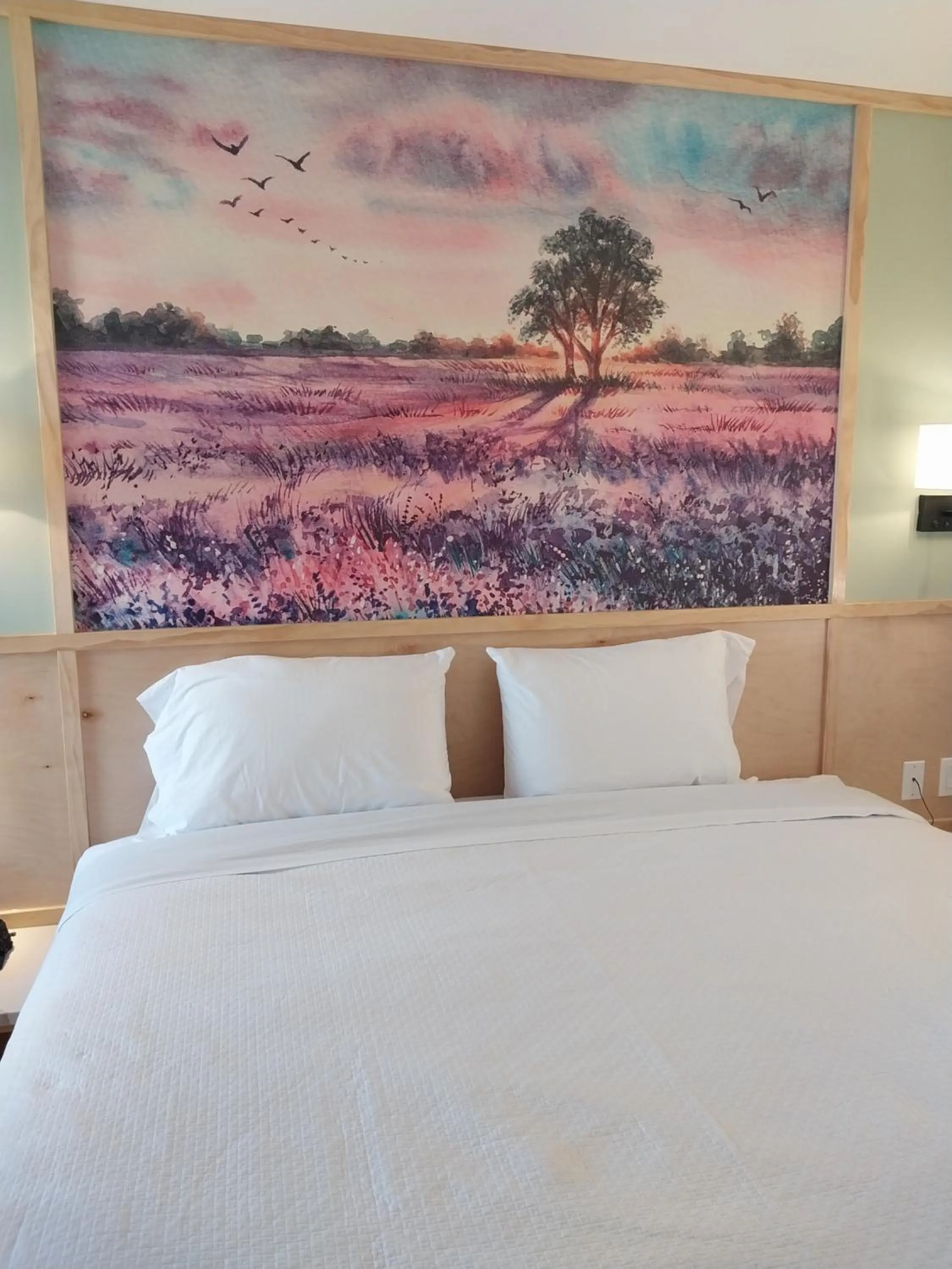 Bed in Greenview Inn Riverhead