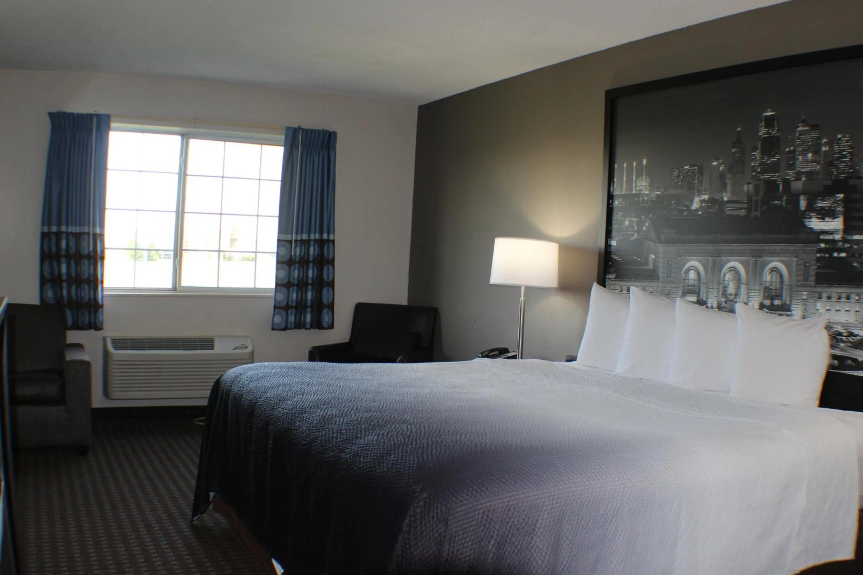 Bed in Super 8 by Wyndham Gardner