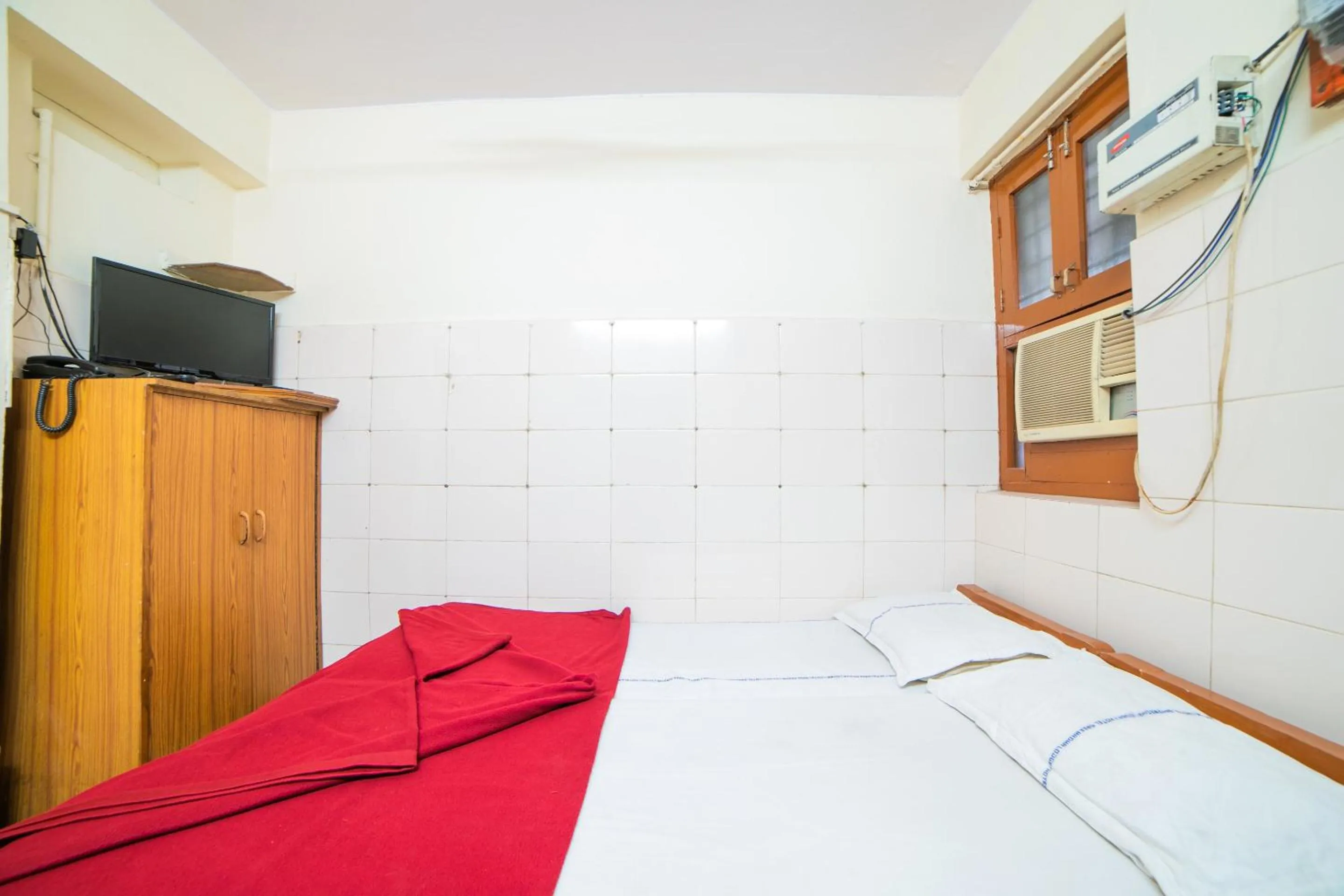 Bedroom, Bed in Hotel O Sree Radha Lodge Near Snow World