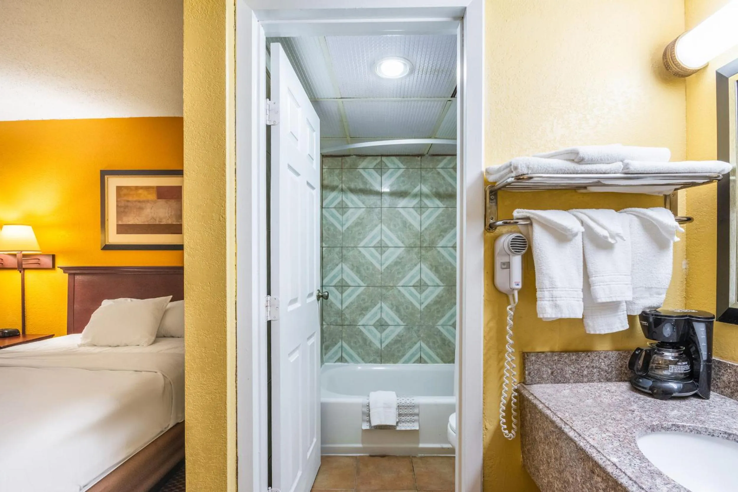 Bathroom, Bed in Americas Best Value Inn of Elk City