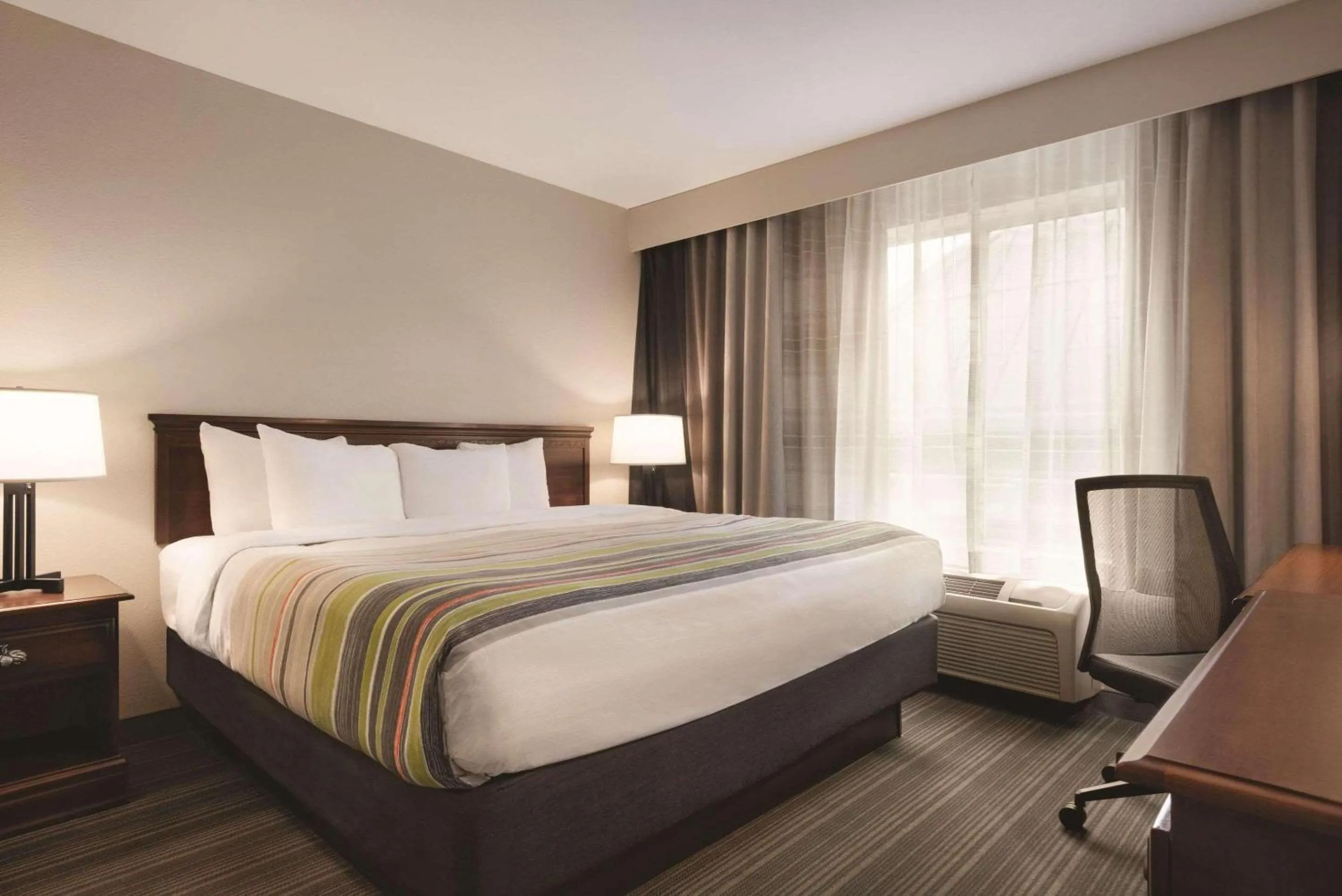 Bedroom, Bed in Country Inn & Suites by Radisson, Michigan City, IN