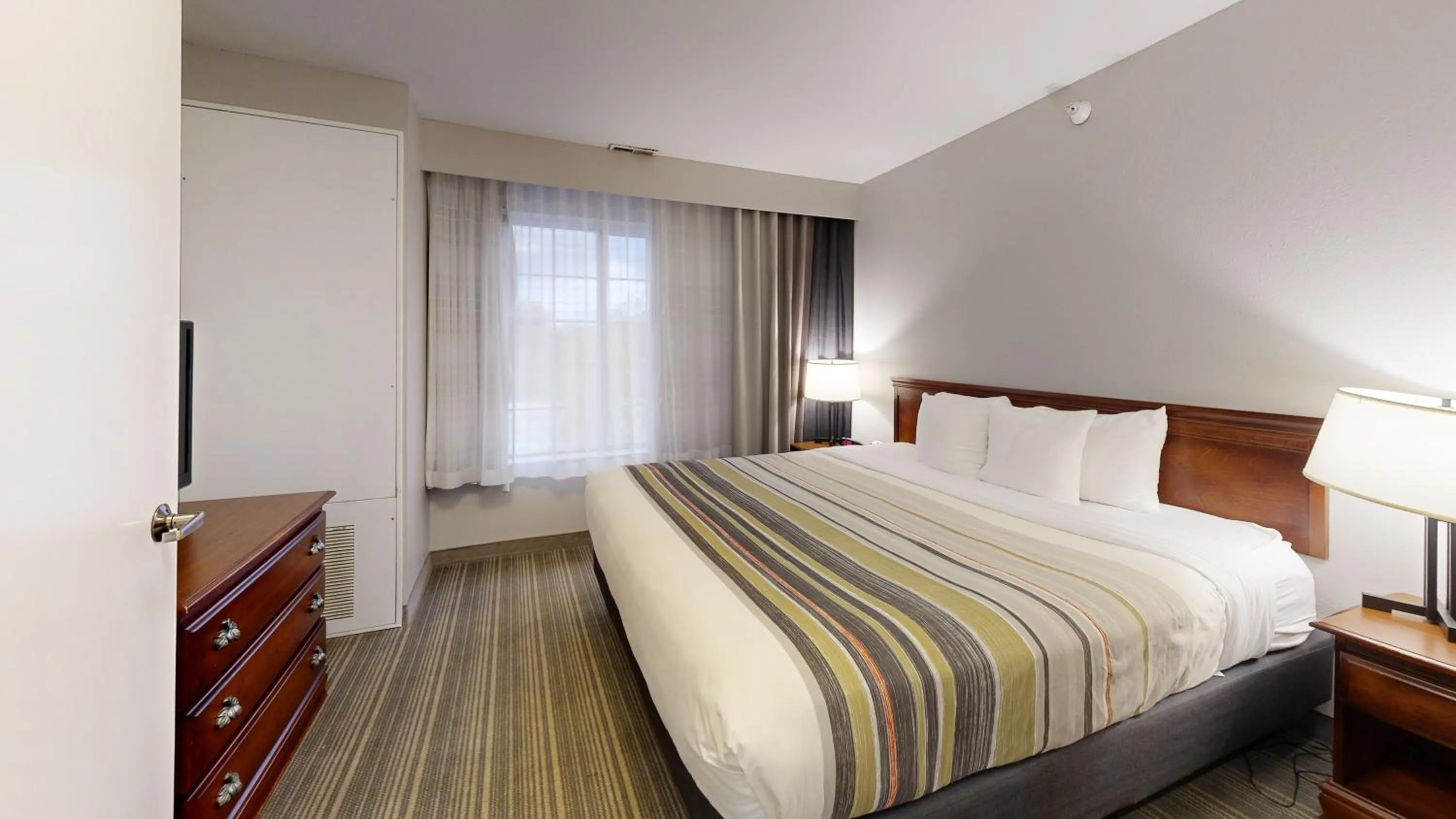 Bedroom, Bed in Country Inn & Suites by Radisson, Michigan City, IN